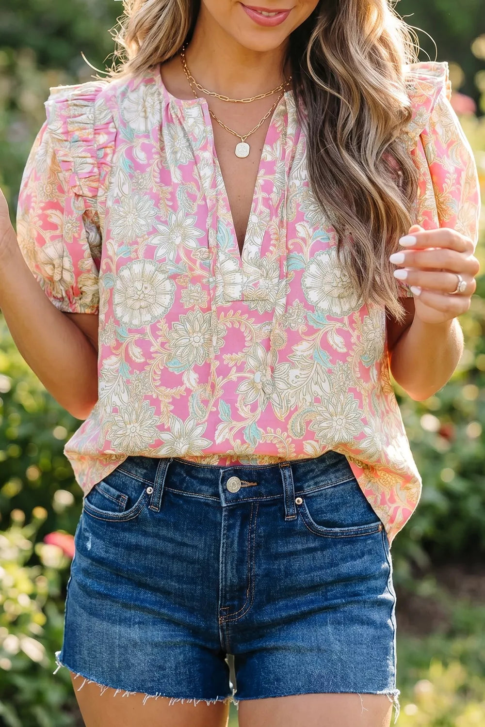 Blush pink floral puff sleeve v neck blouse side view
