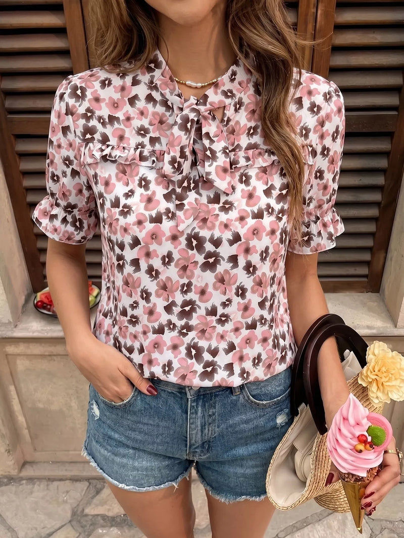 Pink floral tie neck ruffle blouse front view