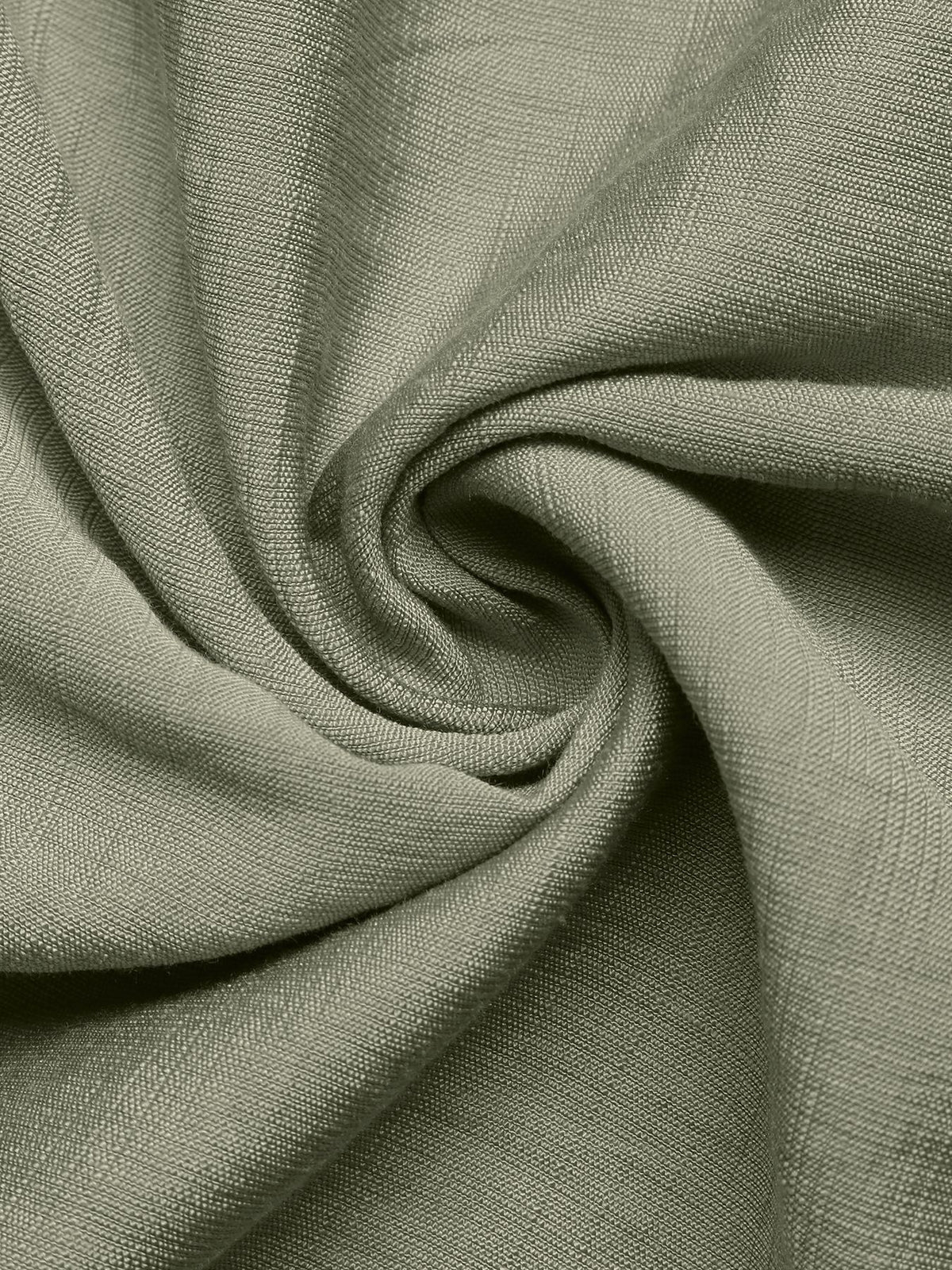 Green smocked dress shown in movement
