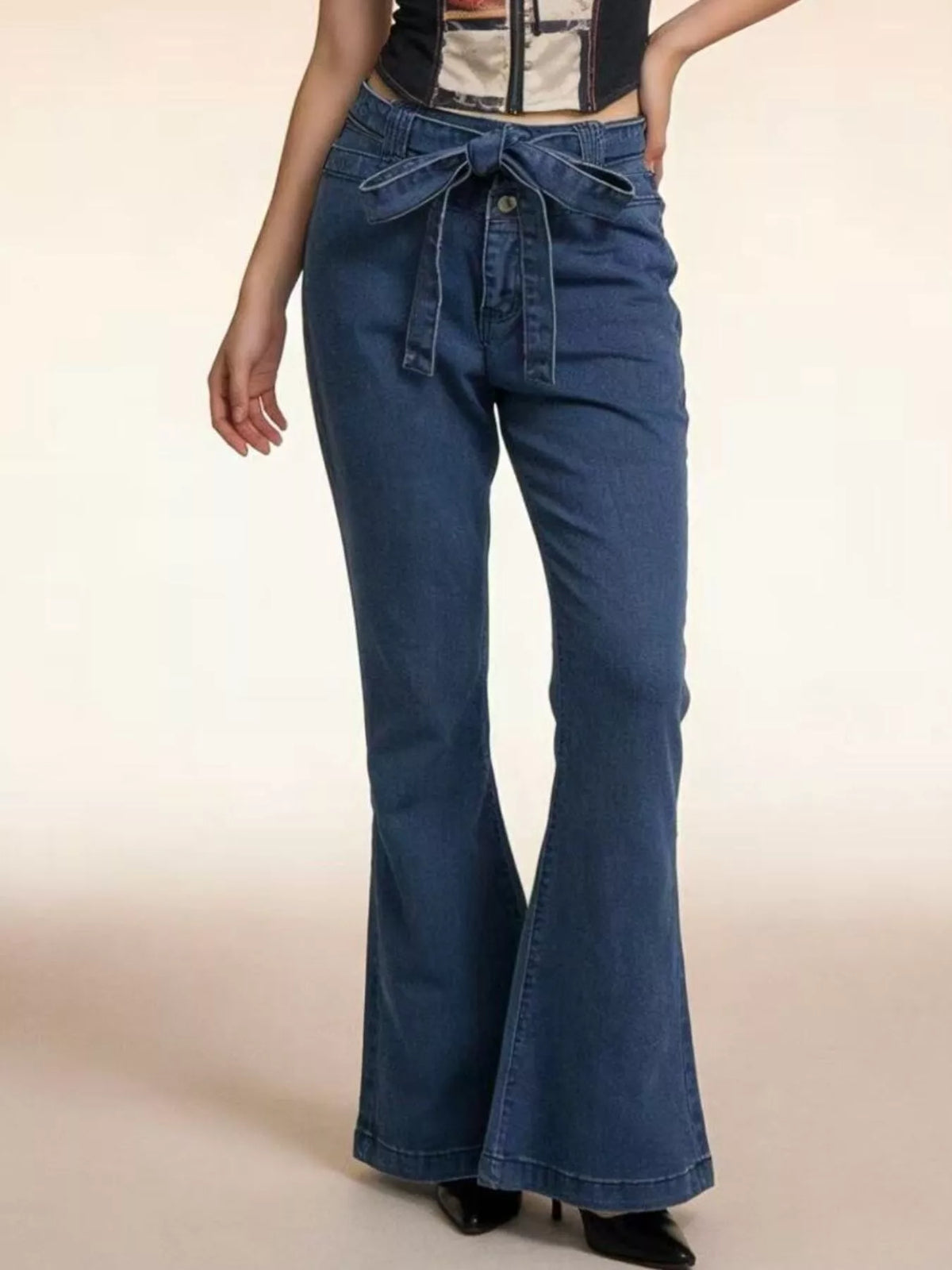 Flare jeans with tie waist side profile