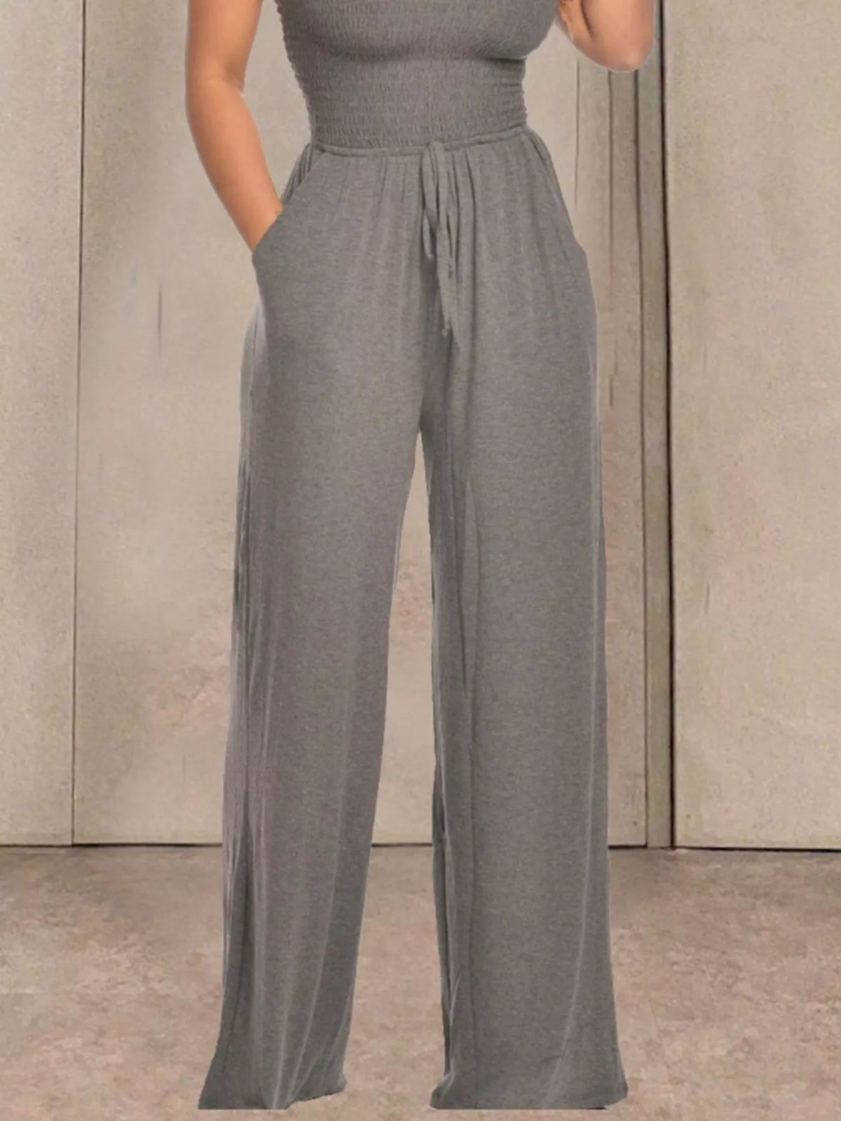 White strapless smocked wide leg jumpsuit back view