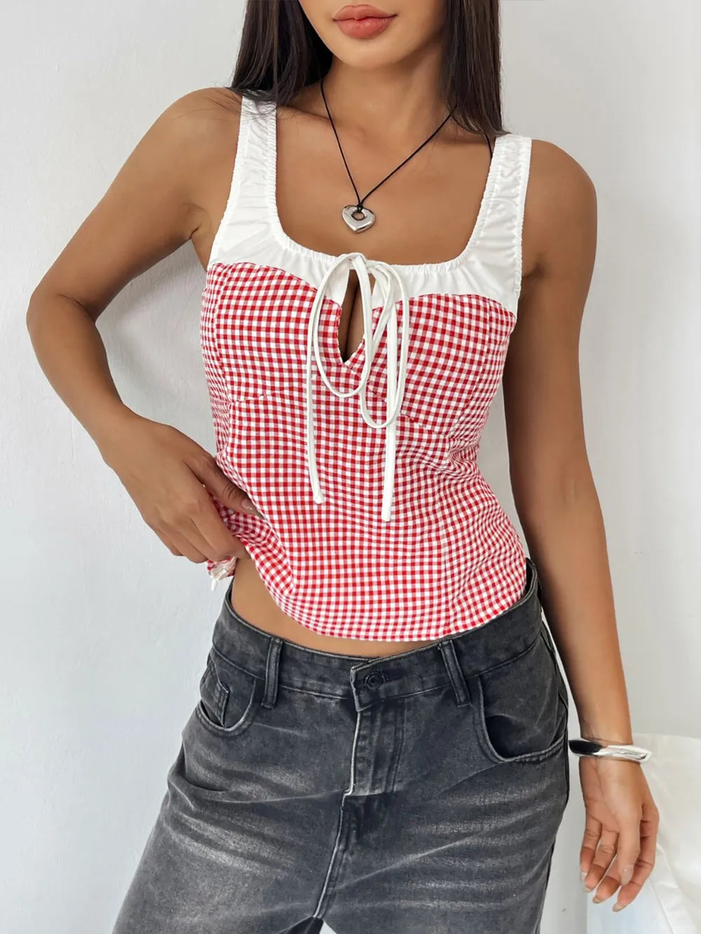 Deep red plaid tank top tie detail close up
