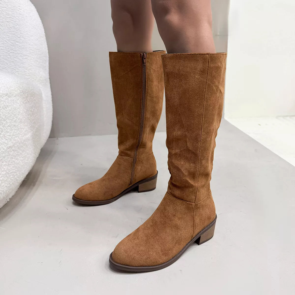 Knee high boots full length on foot