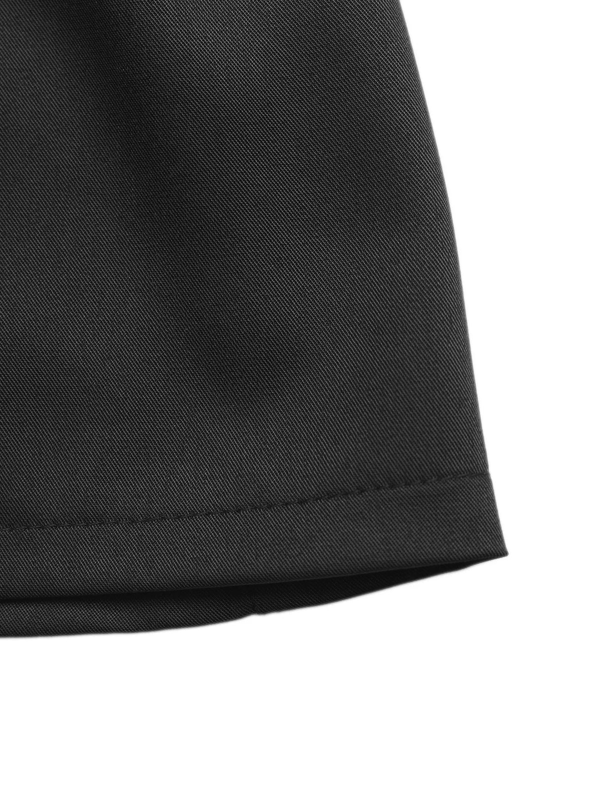Black high waist pleated shorts fabric close up