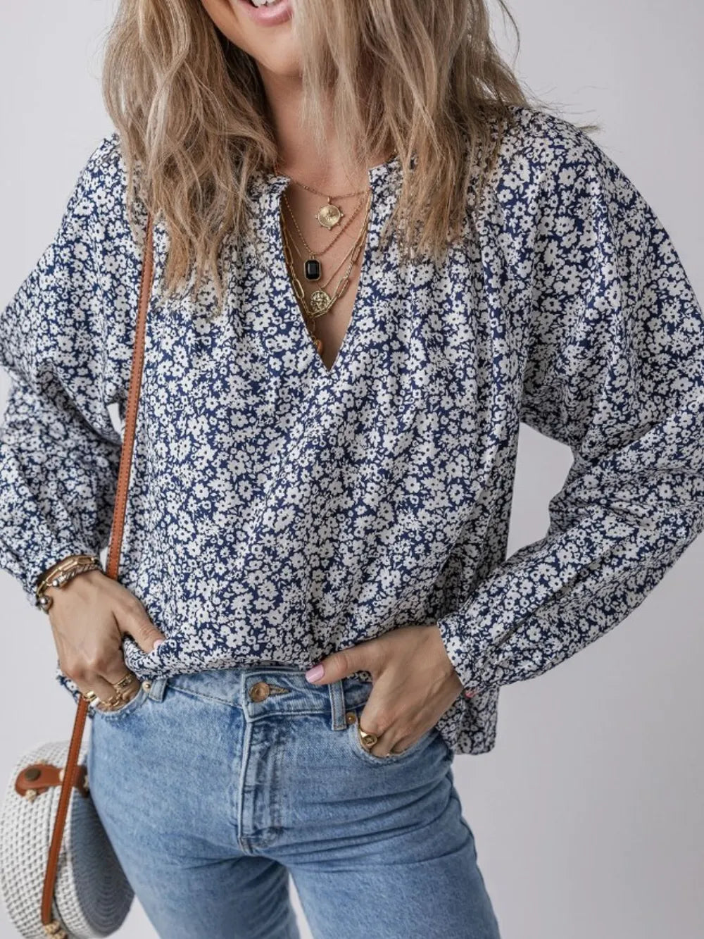 Floral print blouse close up of notched neckline