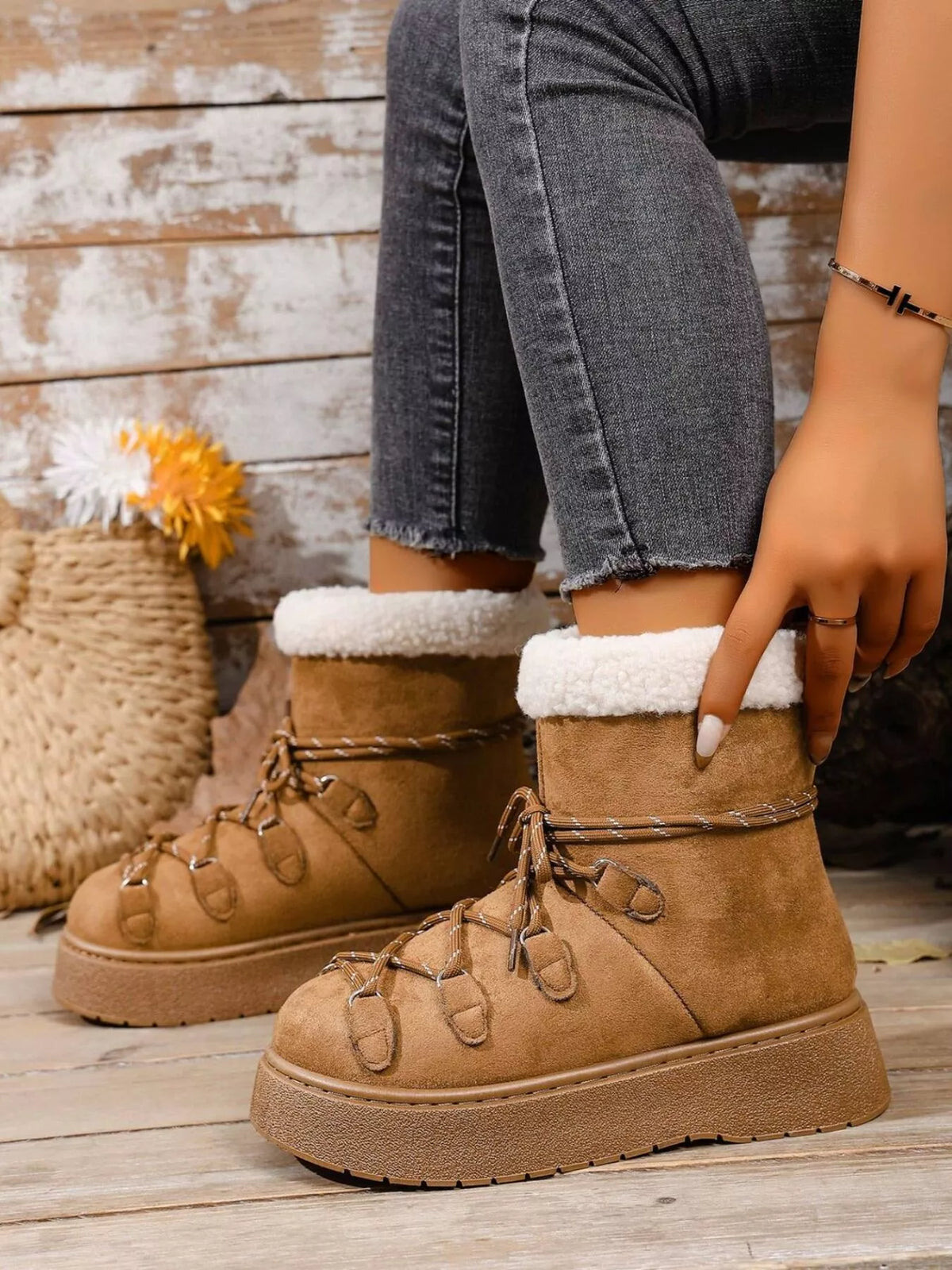 Round toe lace up platform boots pair styled together