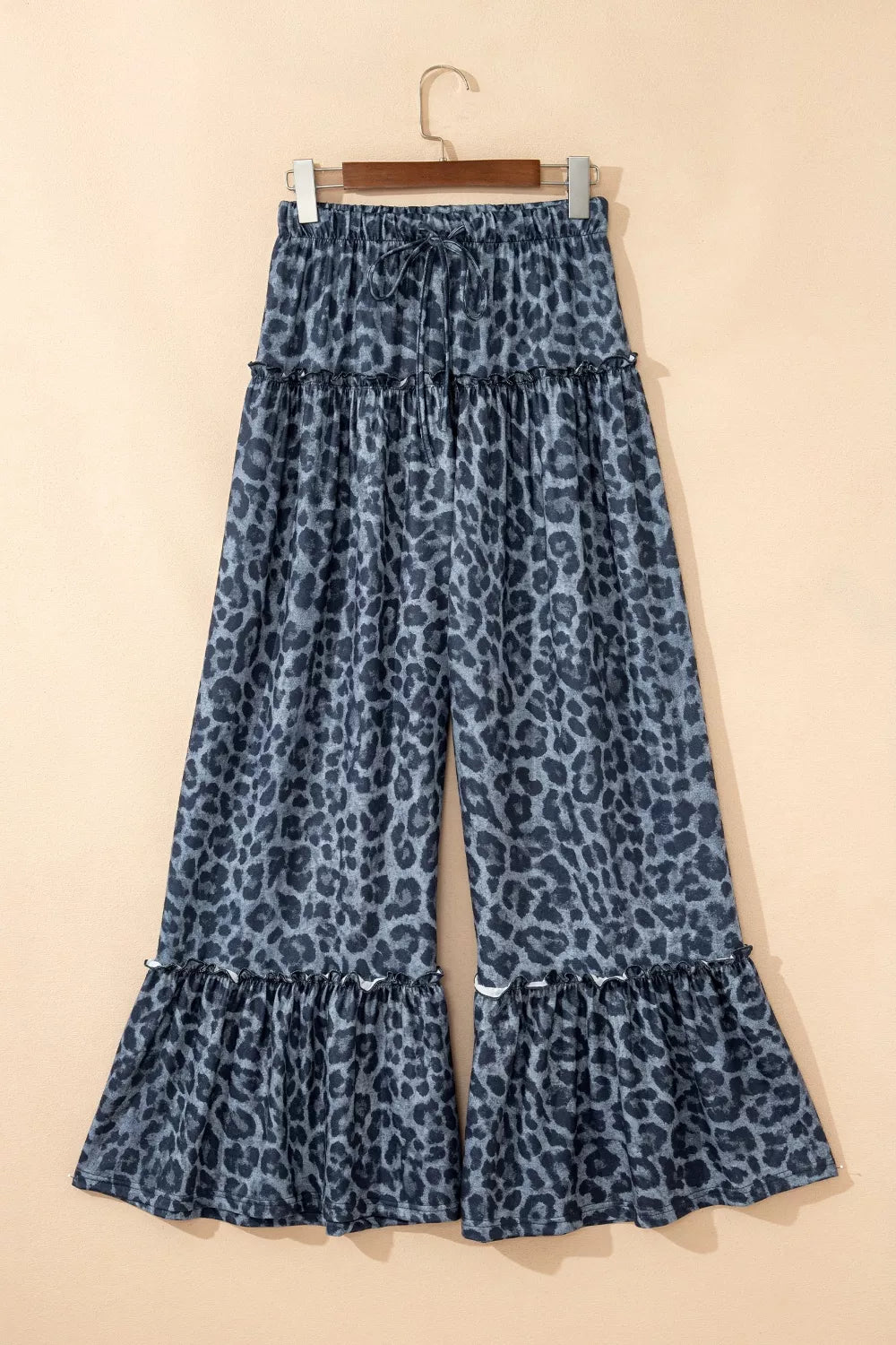Leopard print drawstring wide leg pants on model