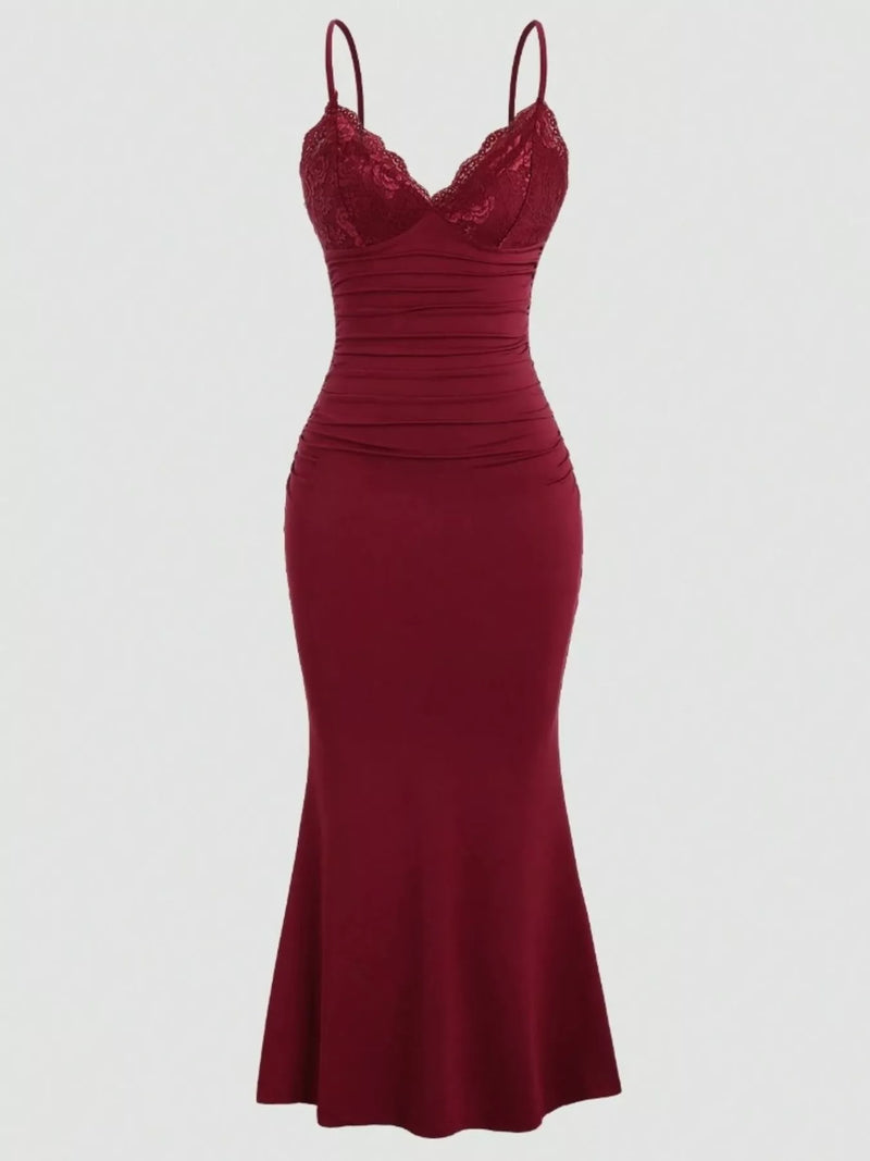 Model wearing the lace trim ruched mermaid dress in a full length front view