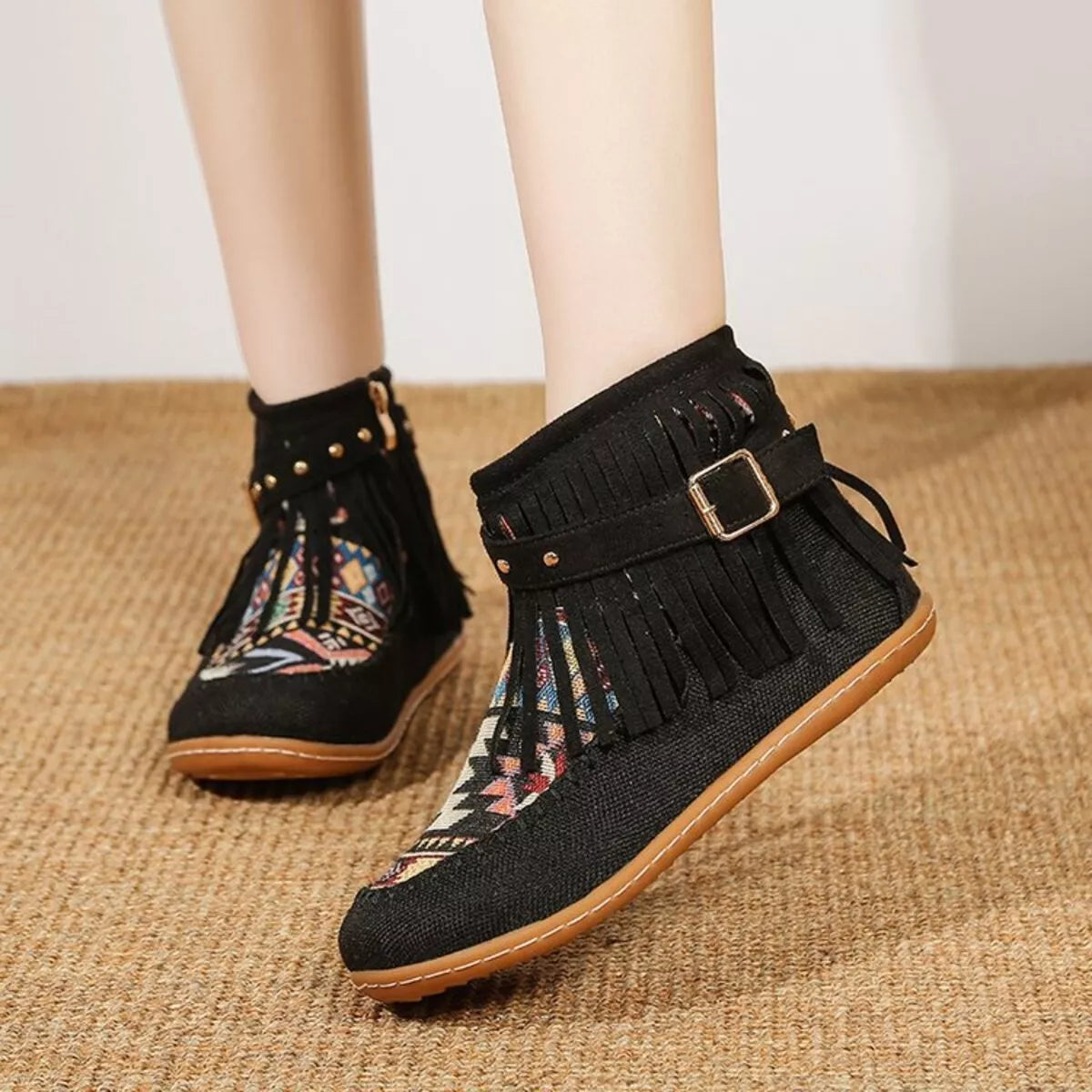 Fringe side zipper ankle boots, angled three quarter view