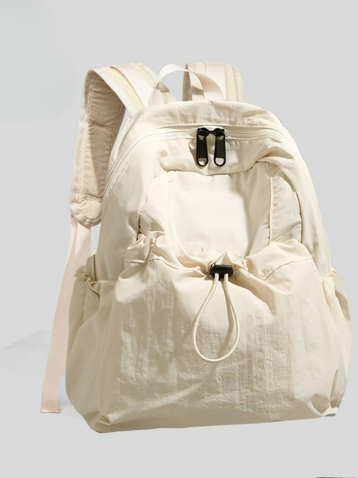 Drawstring backpack top closure detail