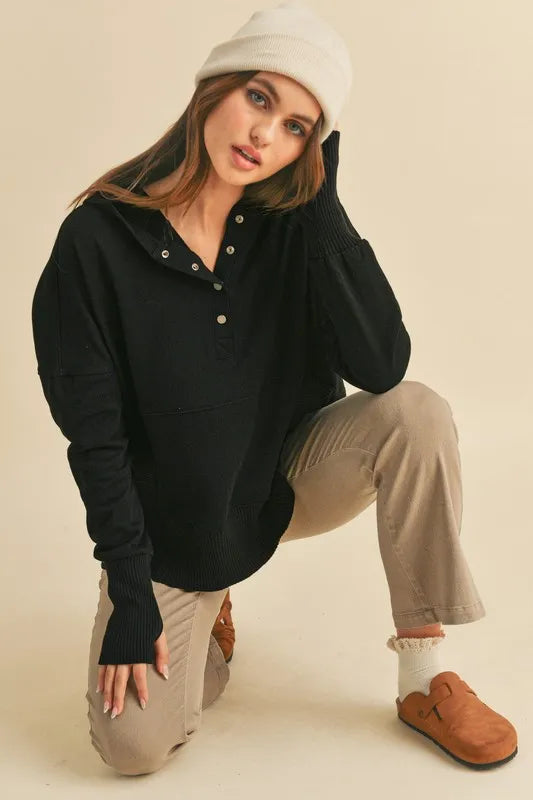 Black half snap dropped shoulder hoodie front view