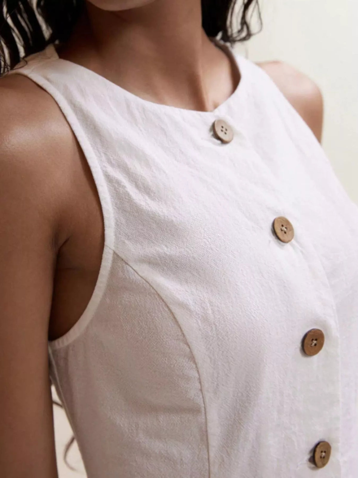 Sleeveless two piece set with decorative buttons