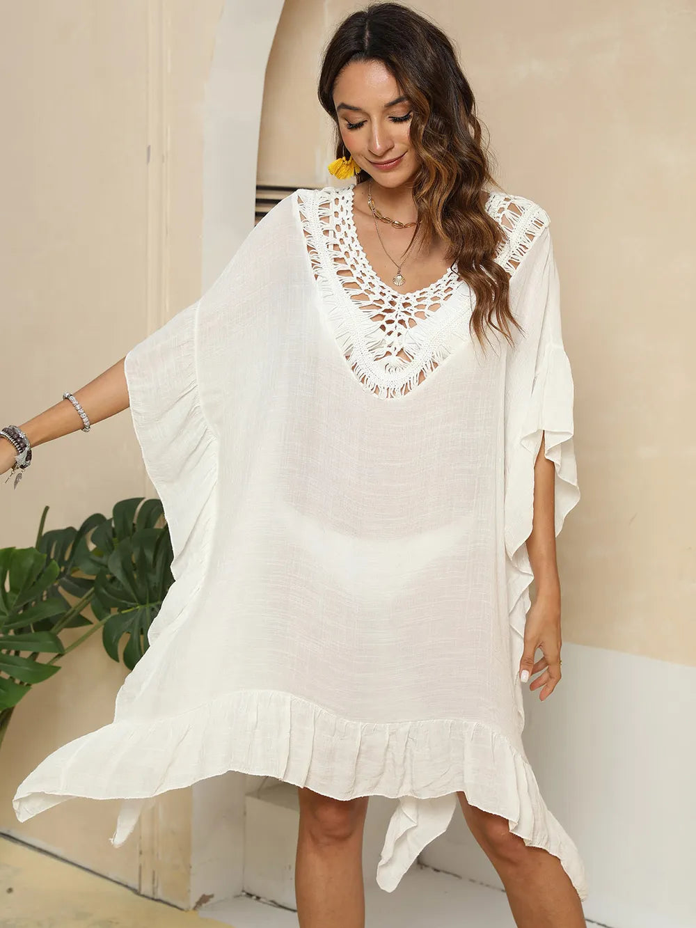 Ivory ruffled cover up styling