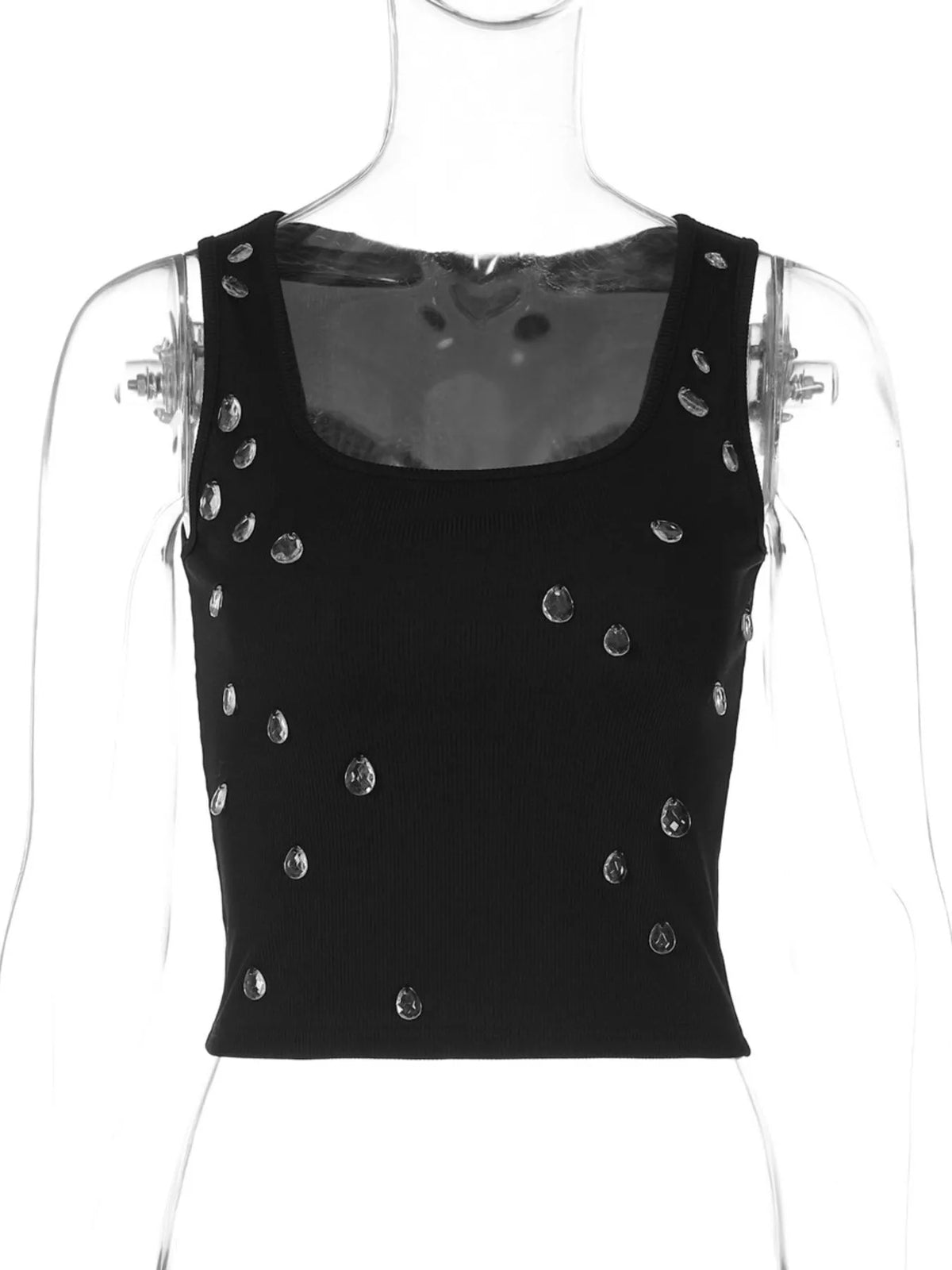 Rhinestones catching light on the womens tank top