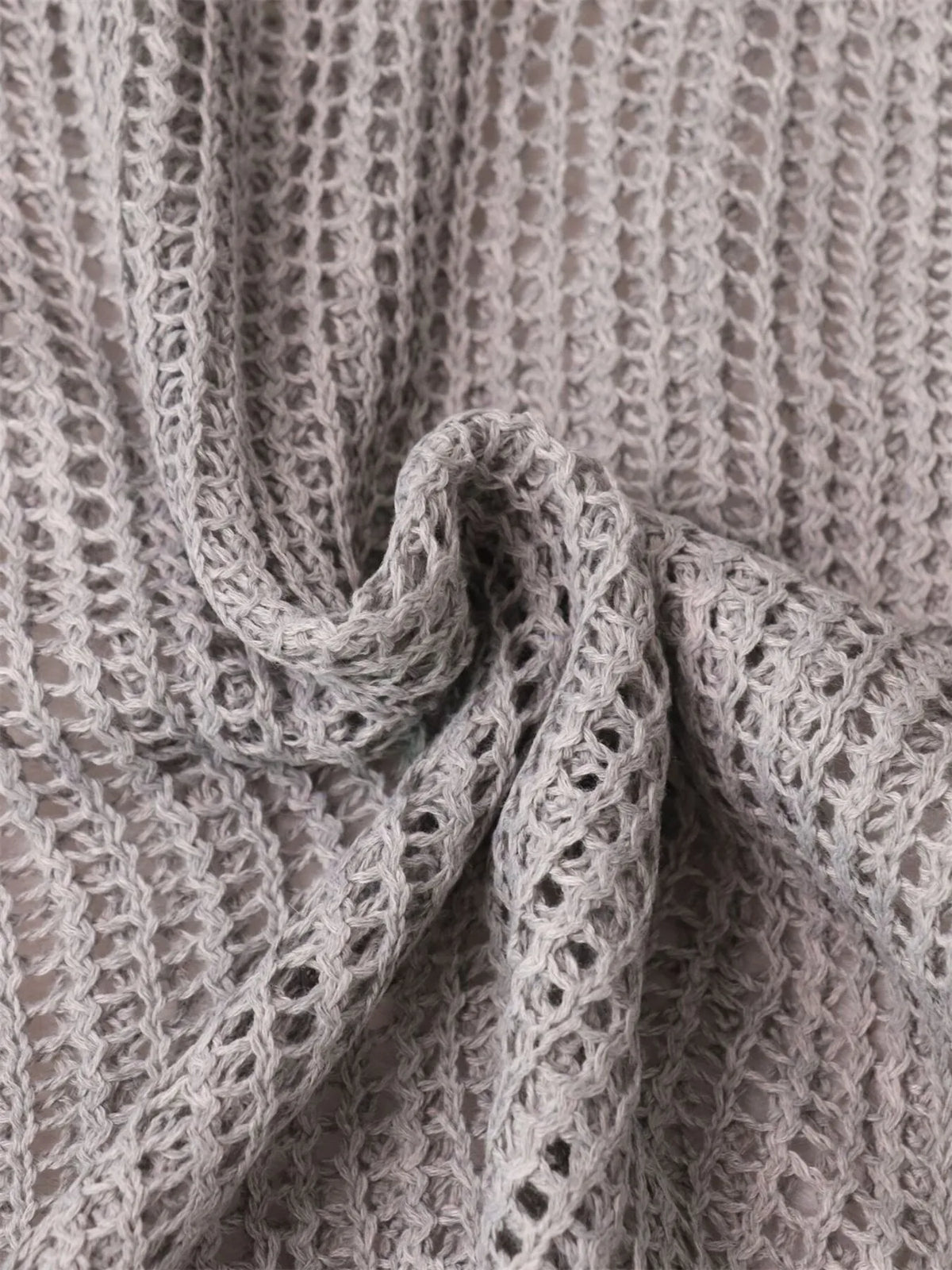 openwork relaxed knit cover up fabric detail