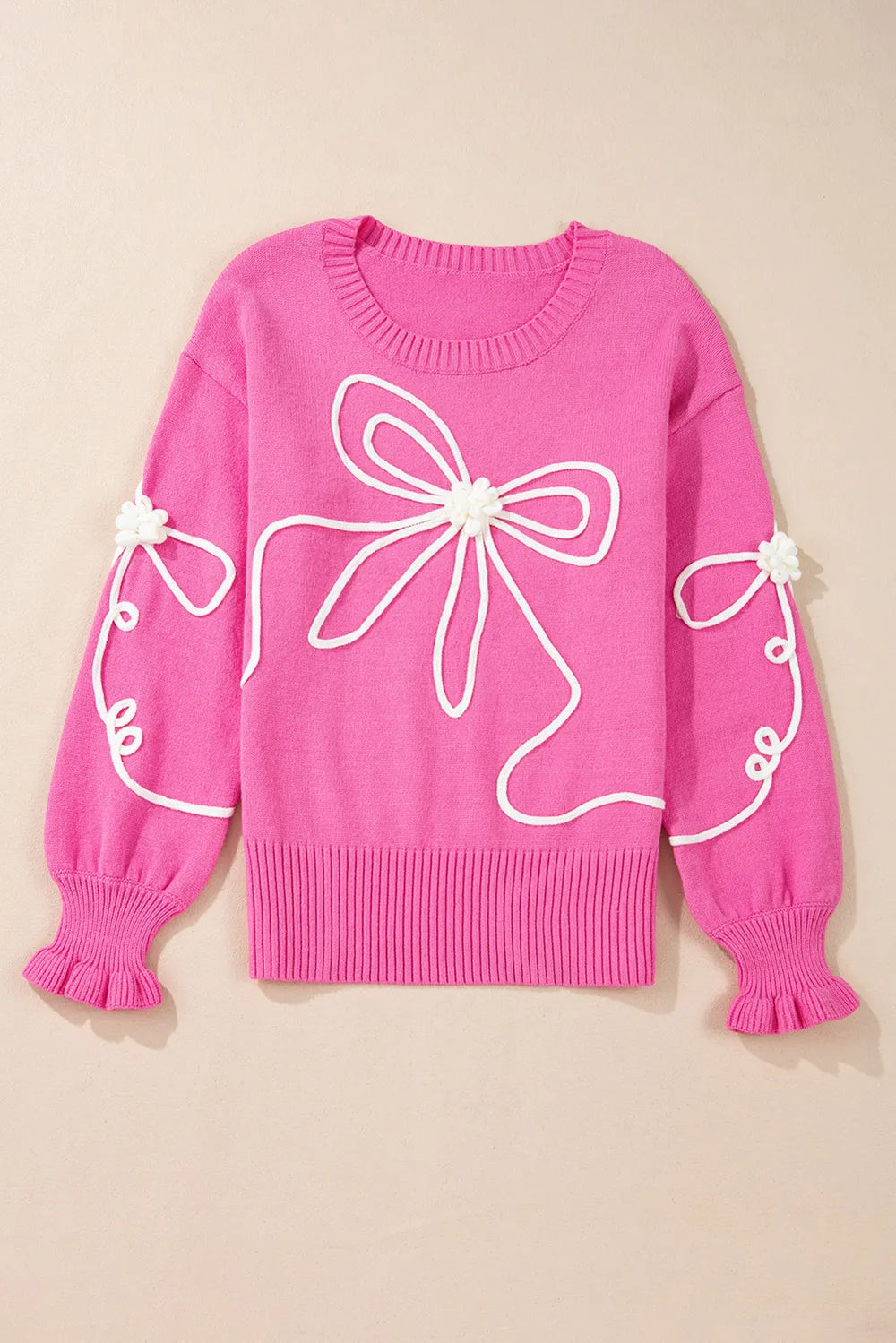 Pink bow sweater knit texture close up