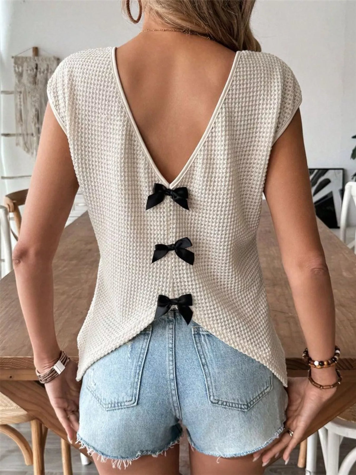 Waffle knit V neck cap sleeve top detail view