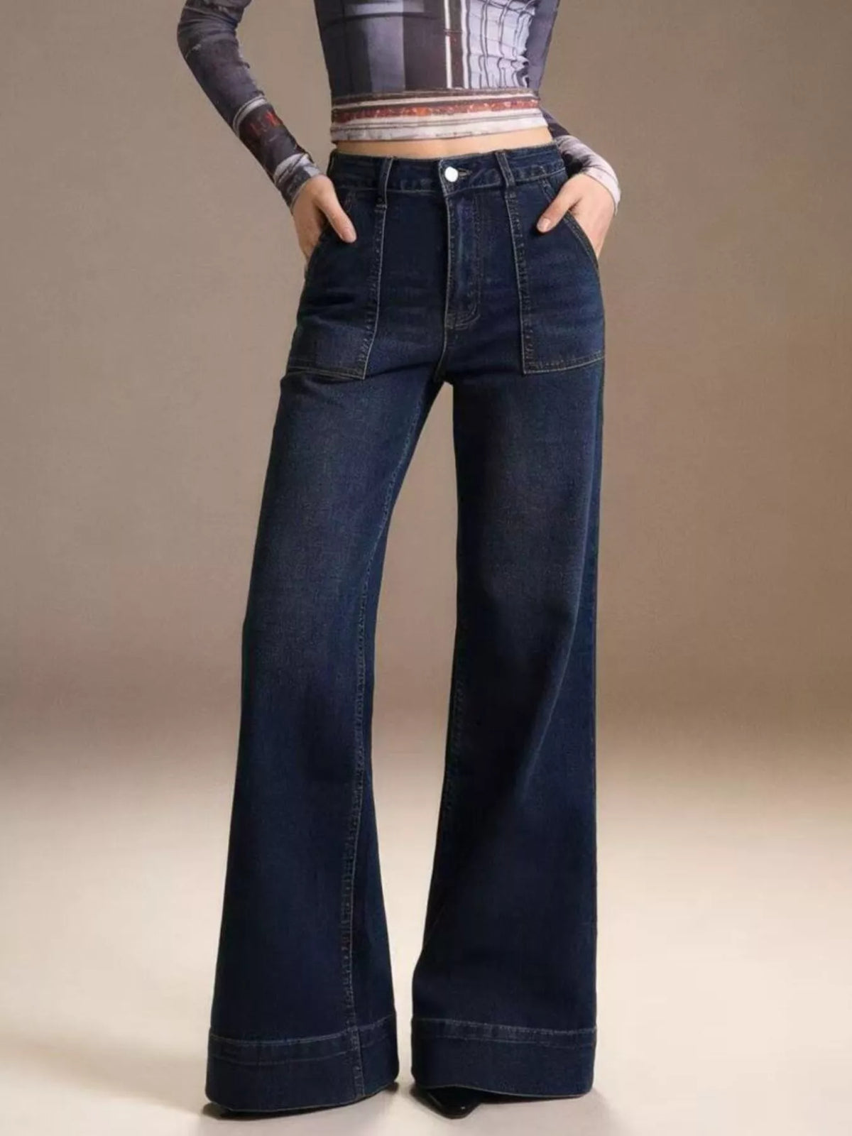 Dark flare jeans styled with heels