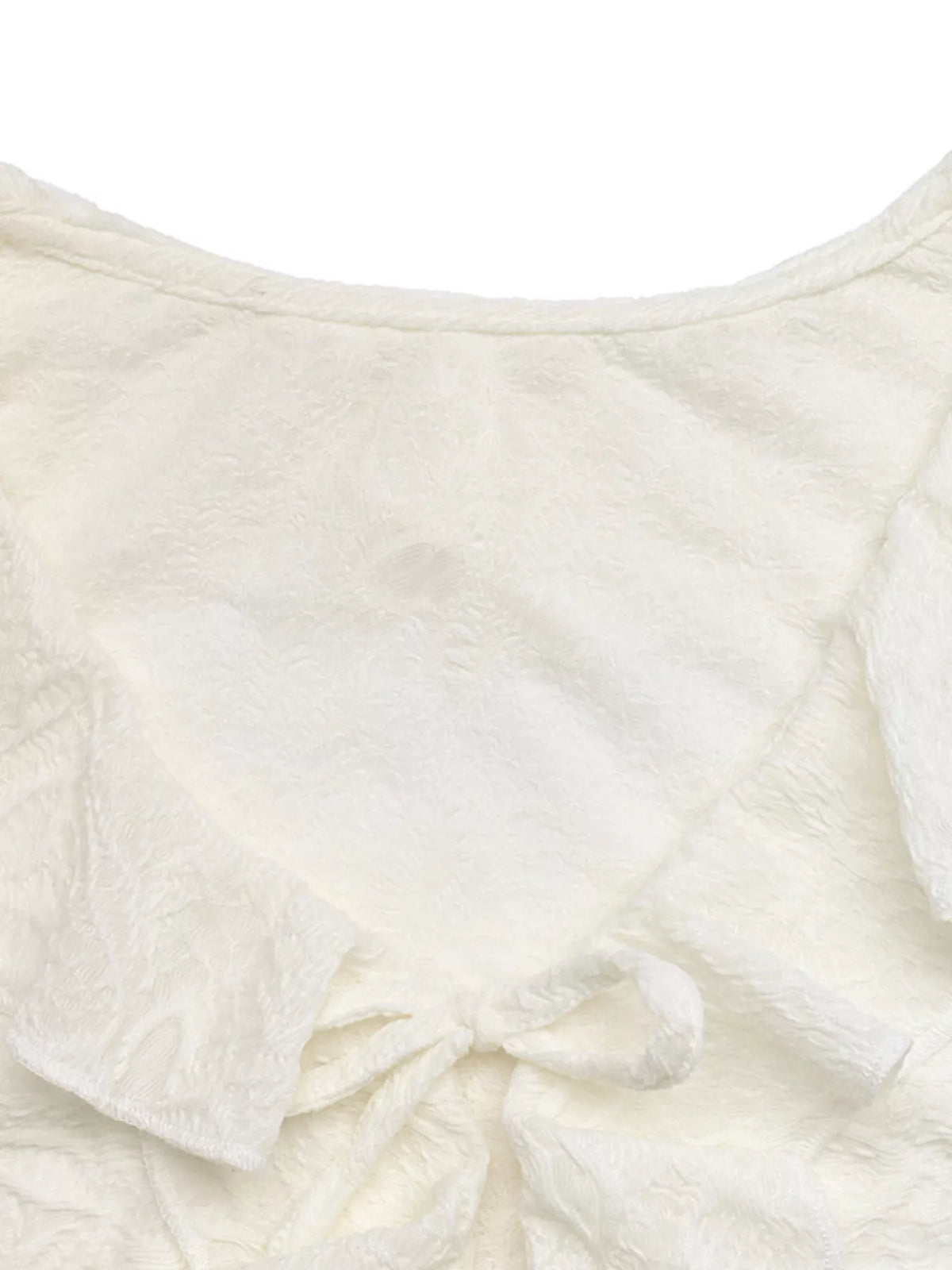 Sleeve and cuff detail on apricot stretch tee