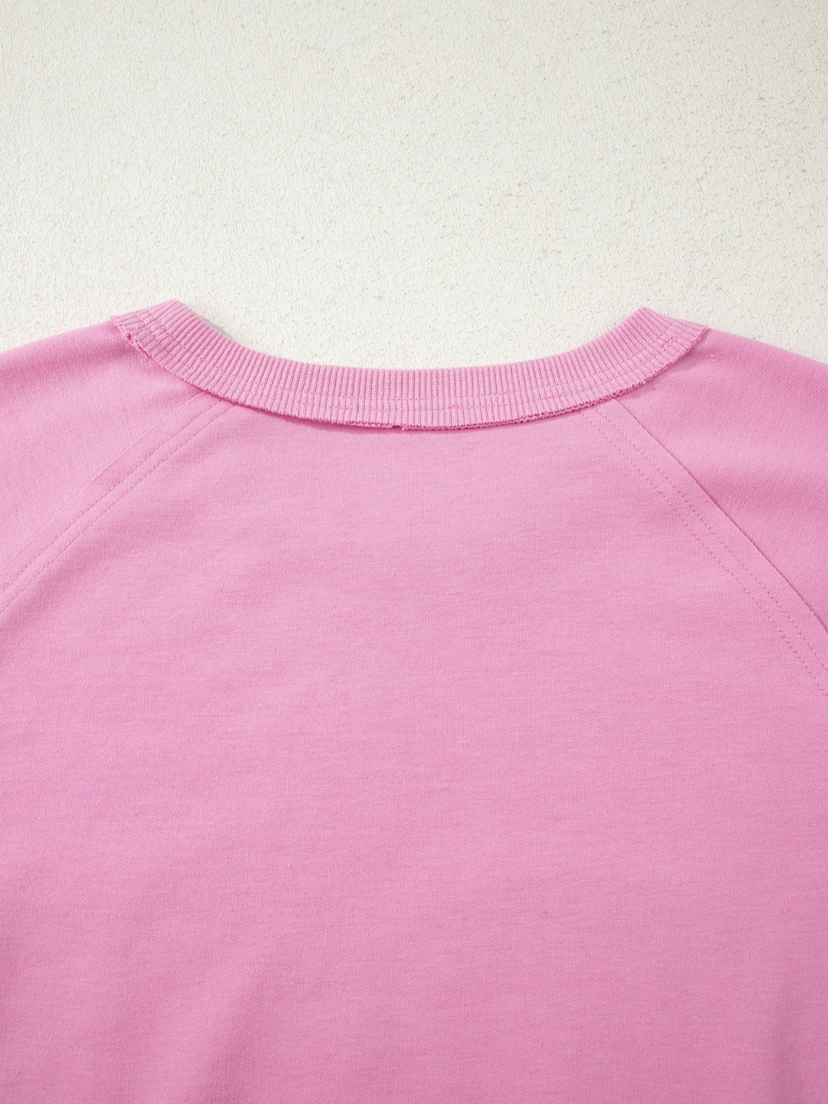 Side view of pink patchwork top