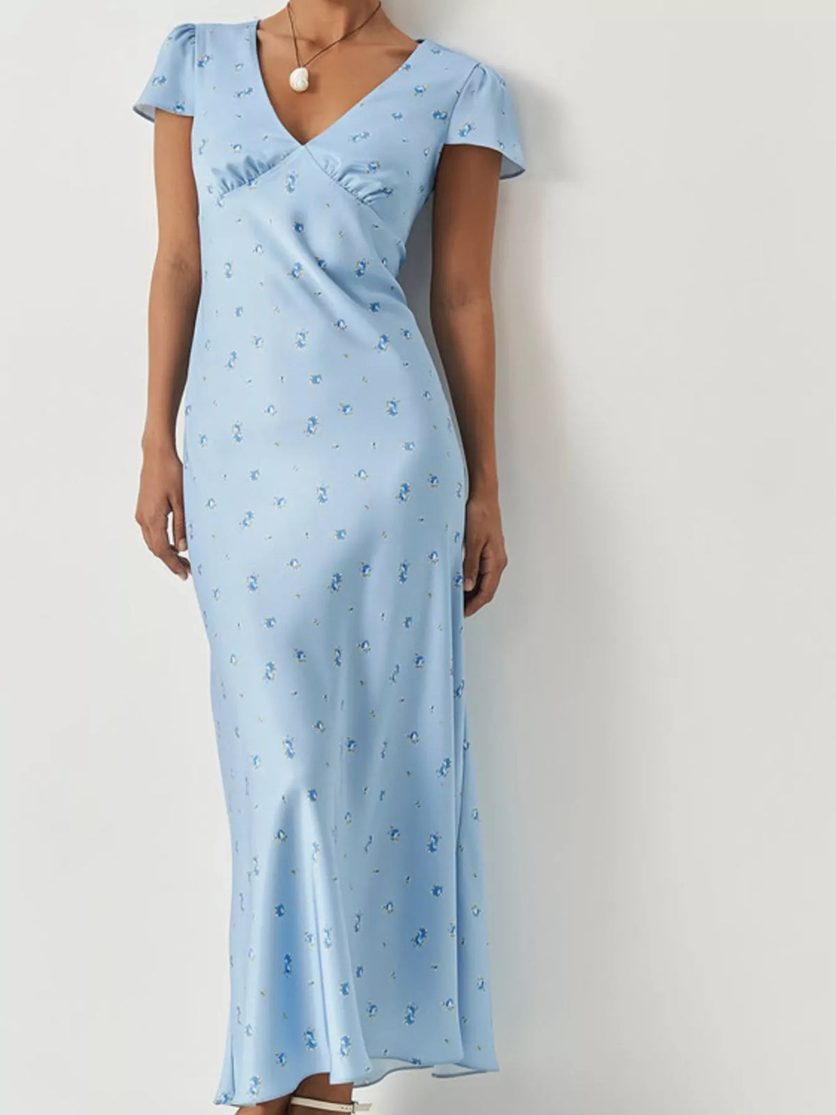 Light blue V neck cap sleeve maxi dress shown on a model