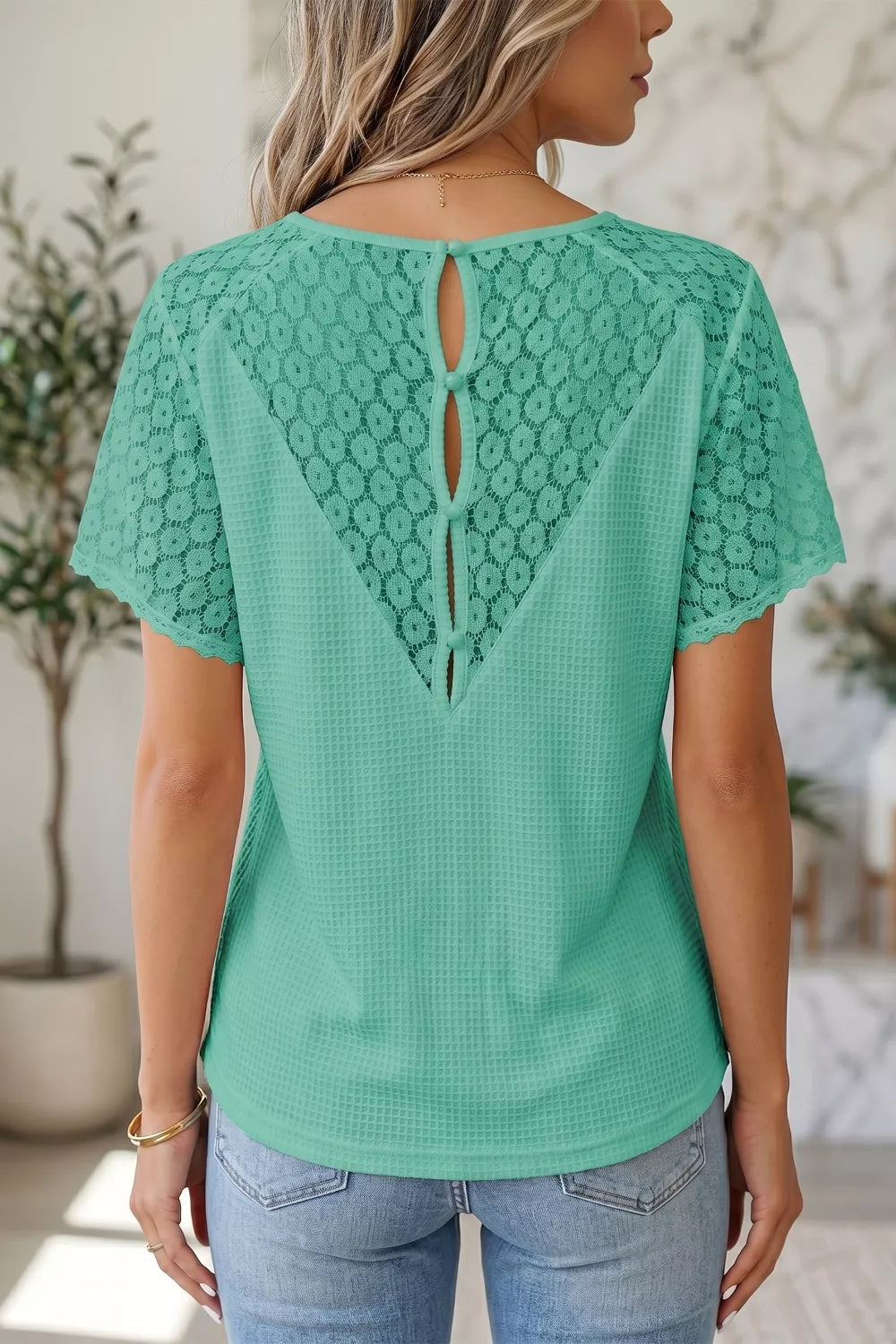 Turquoise waffle knit v neck top with lace trim front view