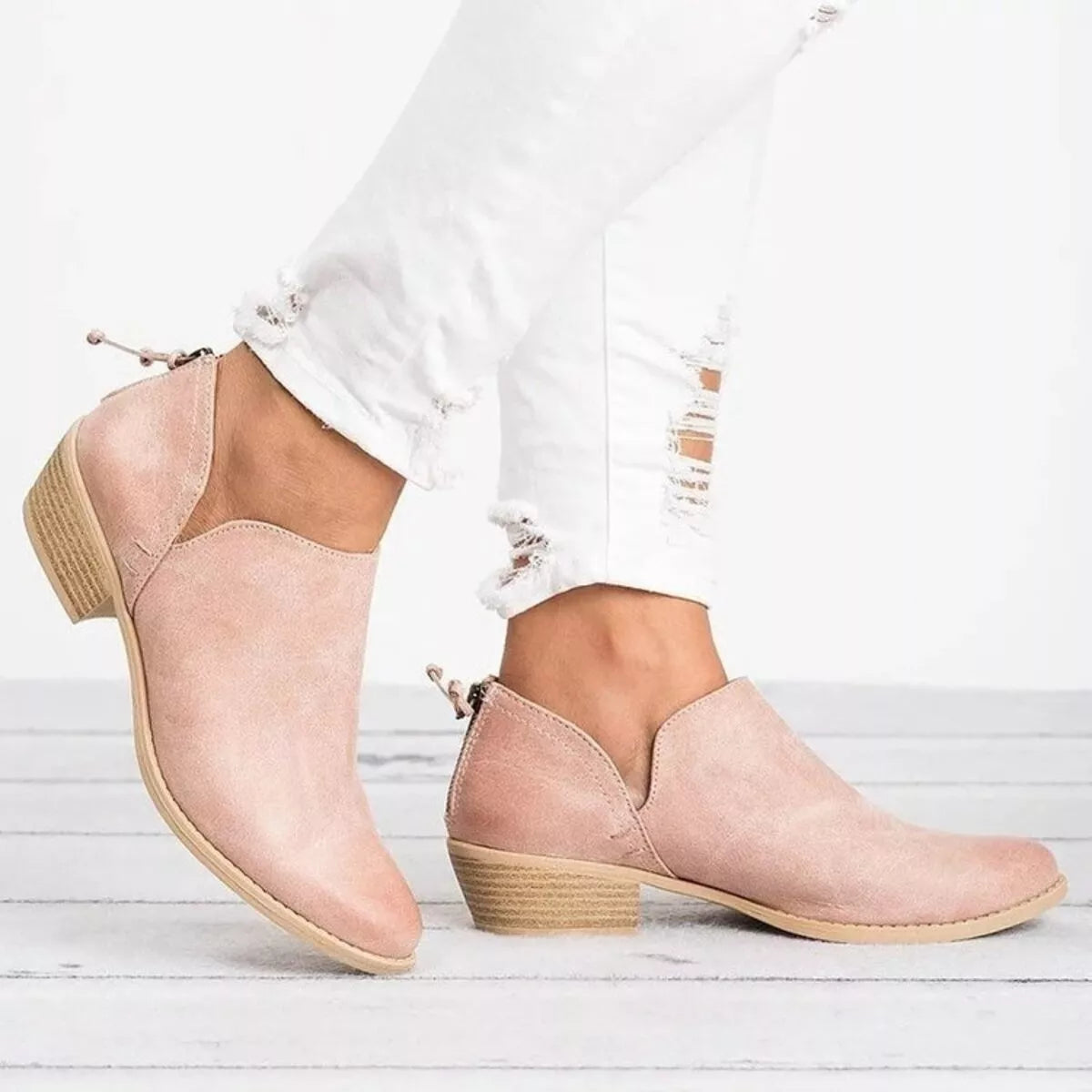 Point toe low heel boots top down view