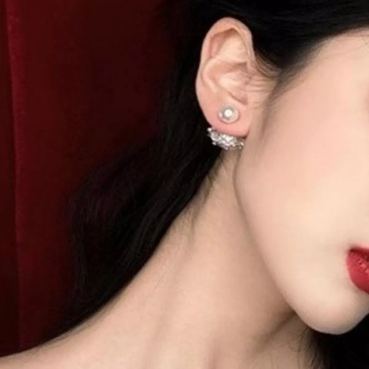 Synthetic pearl stud earrings pair detail