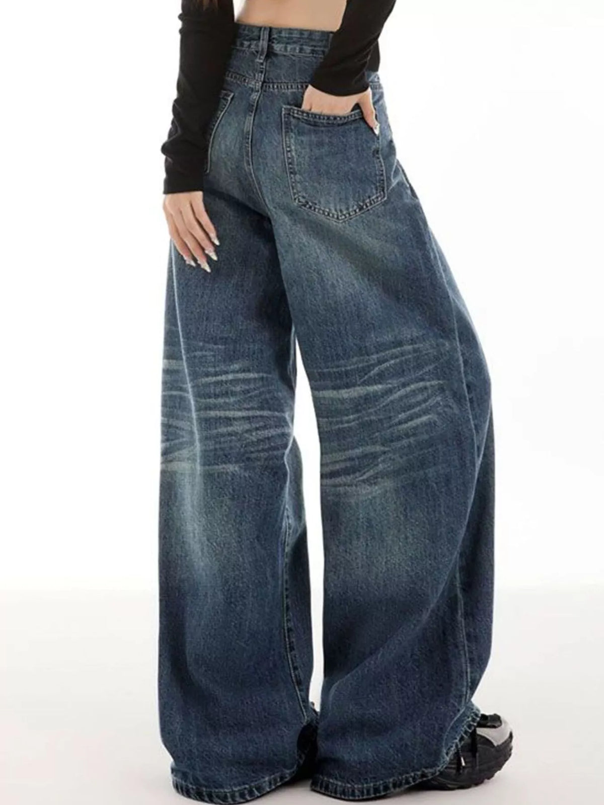 Full length styling of vintage blue wide leg jeans