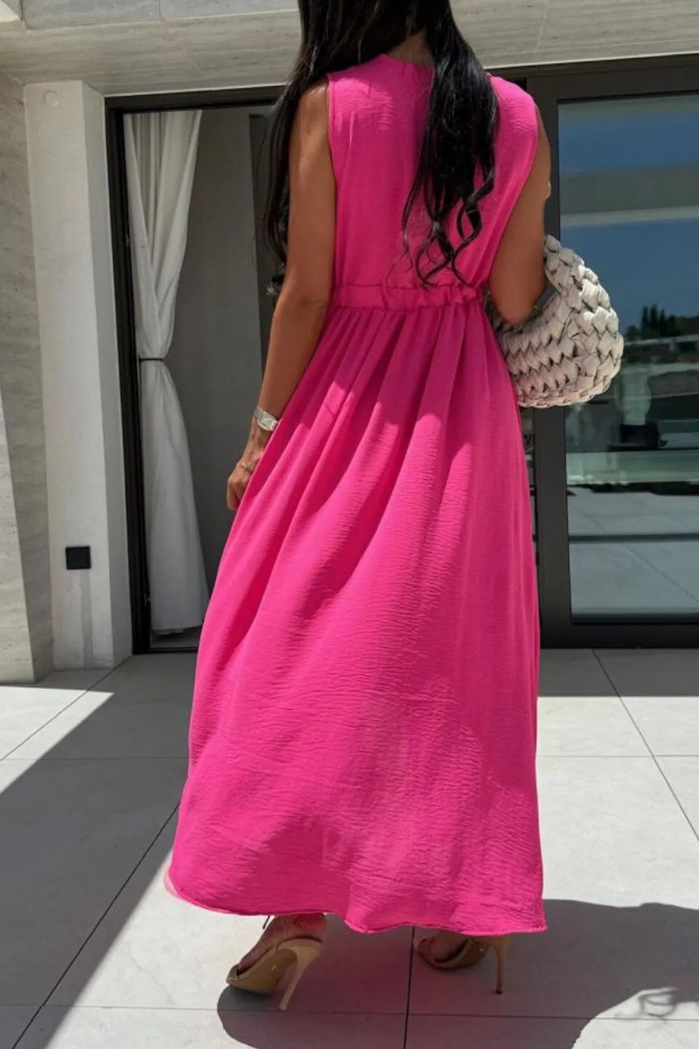 sleeveless surplice wrap maxi dress with leg slit front view