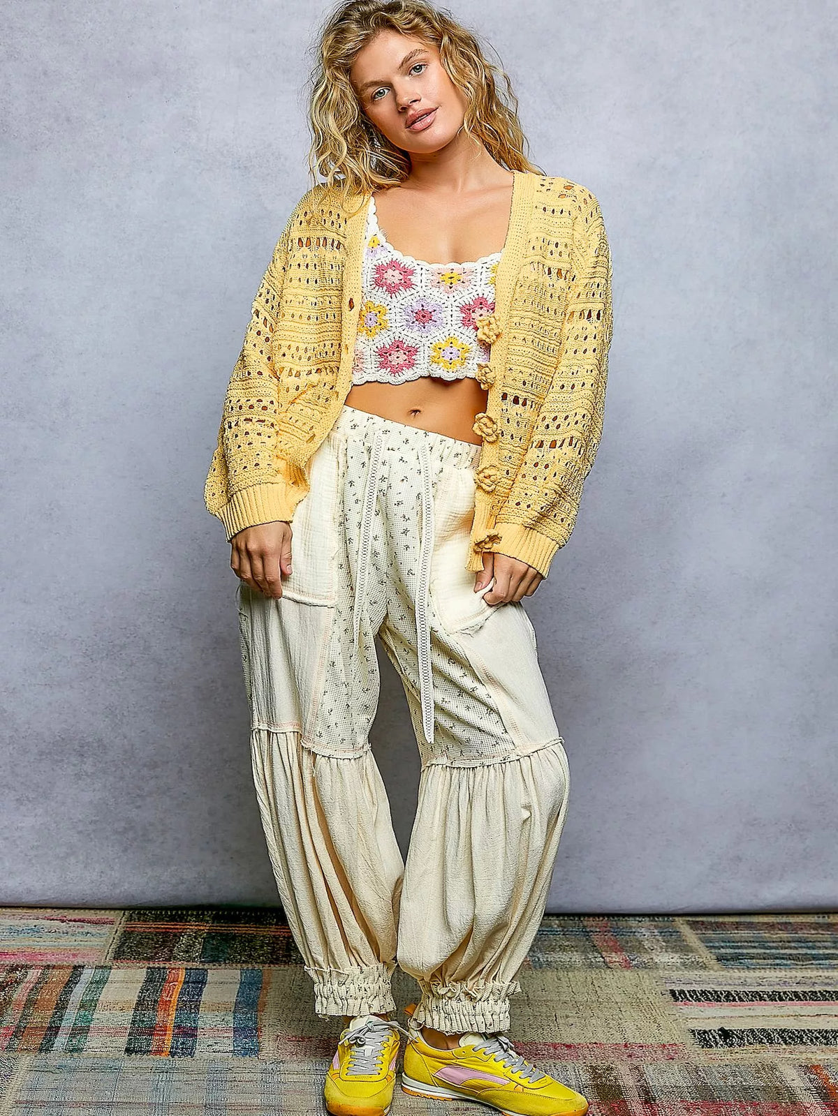 Yellow floral button open knit cardigan back view
