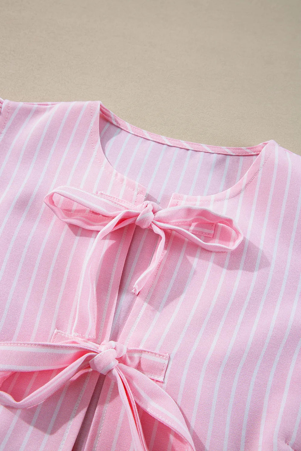 Striped blouse styled with trousers