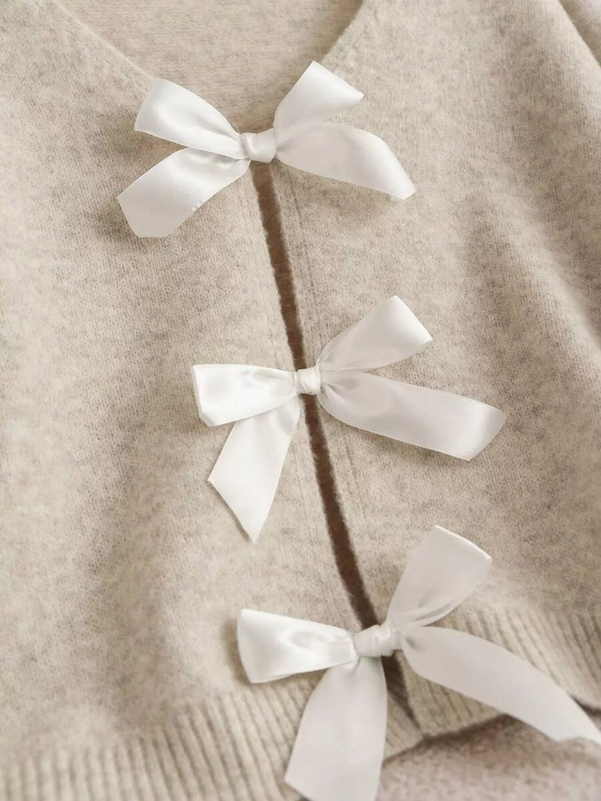 V neck bow cardigan front styling