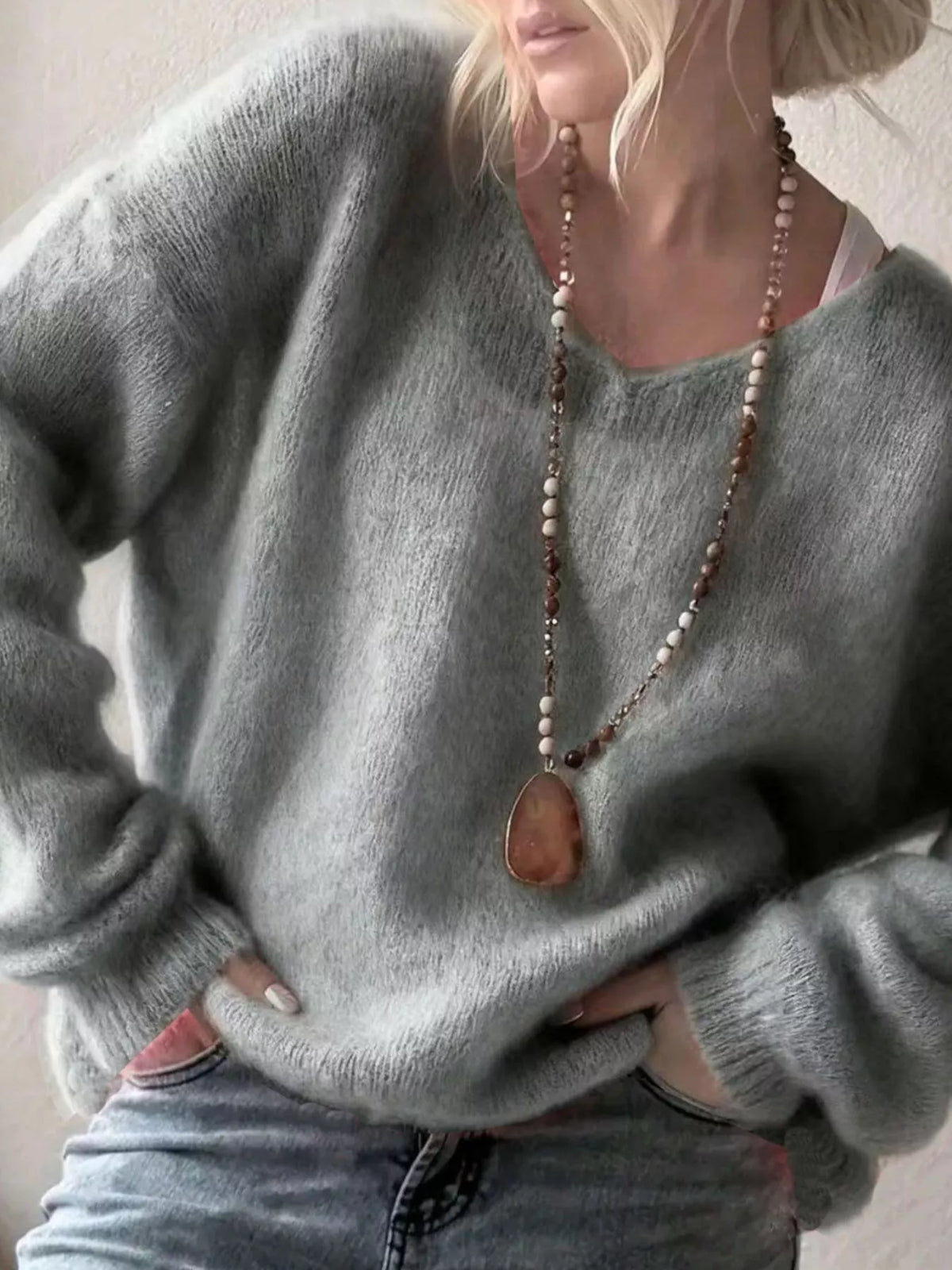v neck dropped shoulder sweater hem detail
