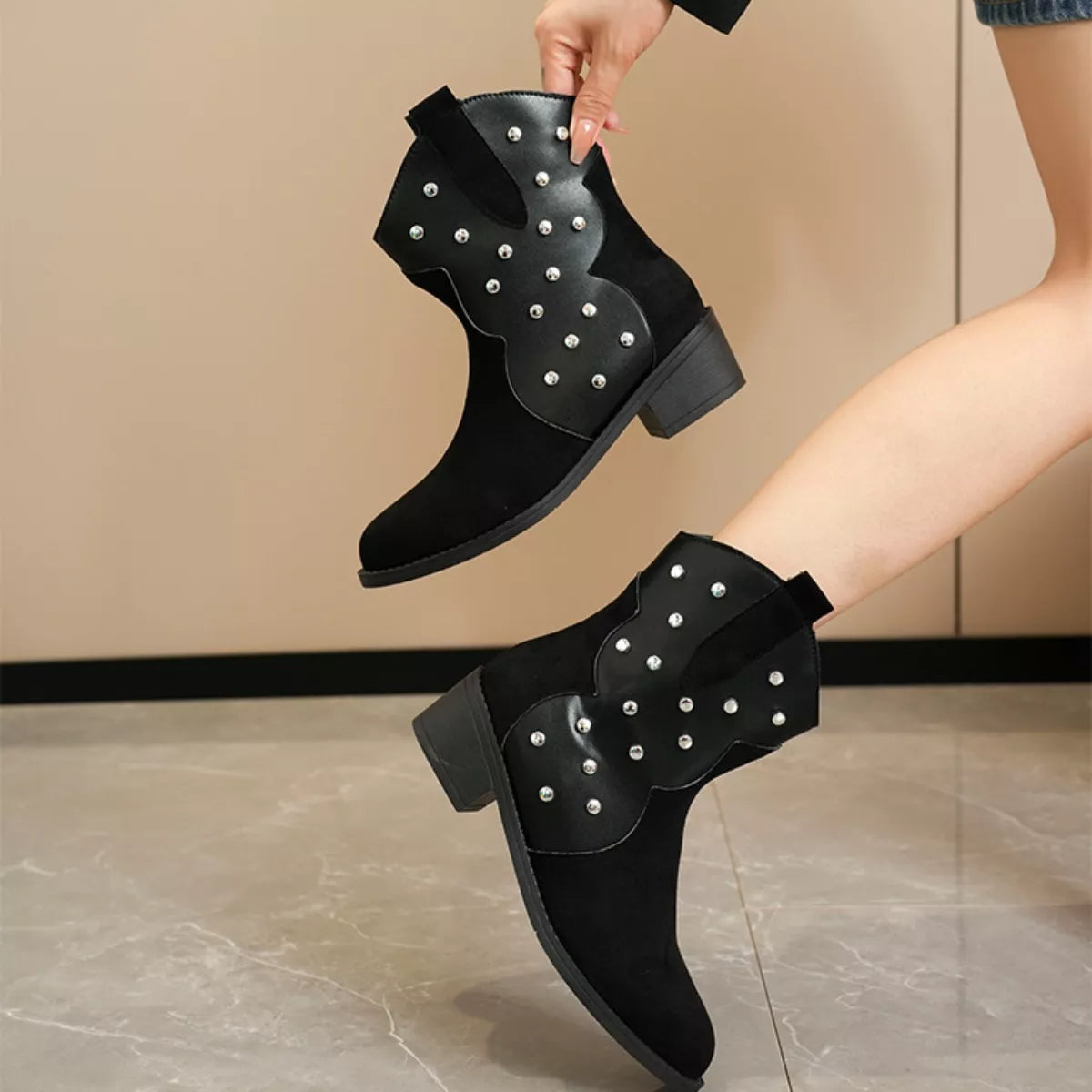 Studded western ankle boots heel detail