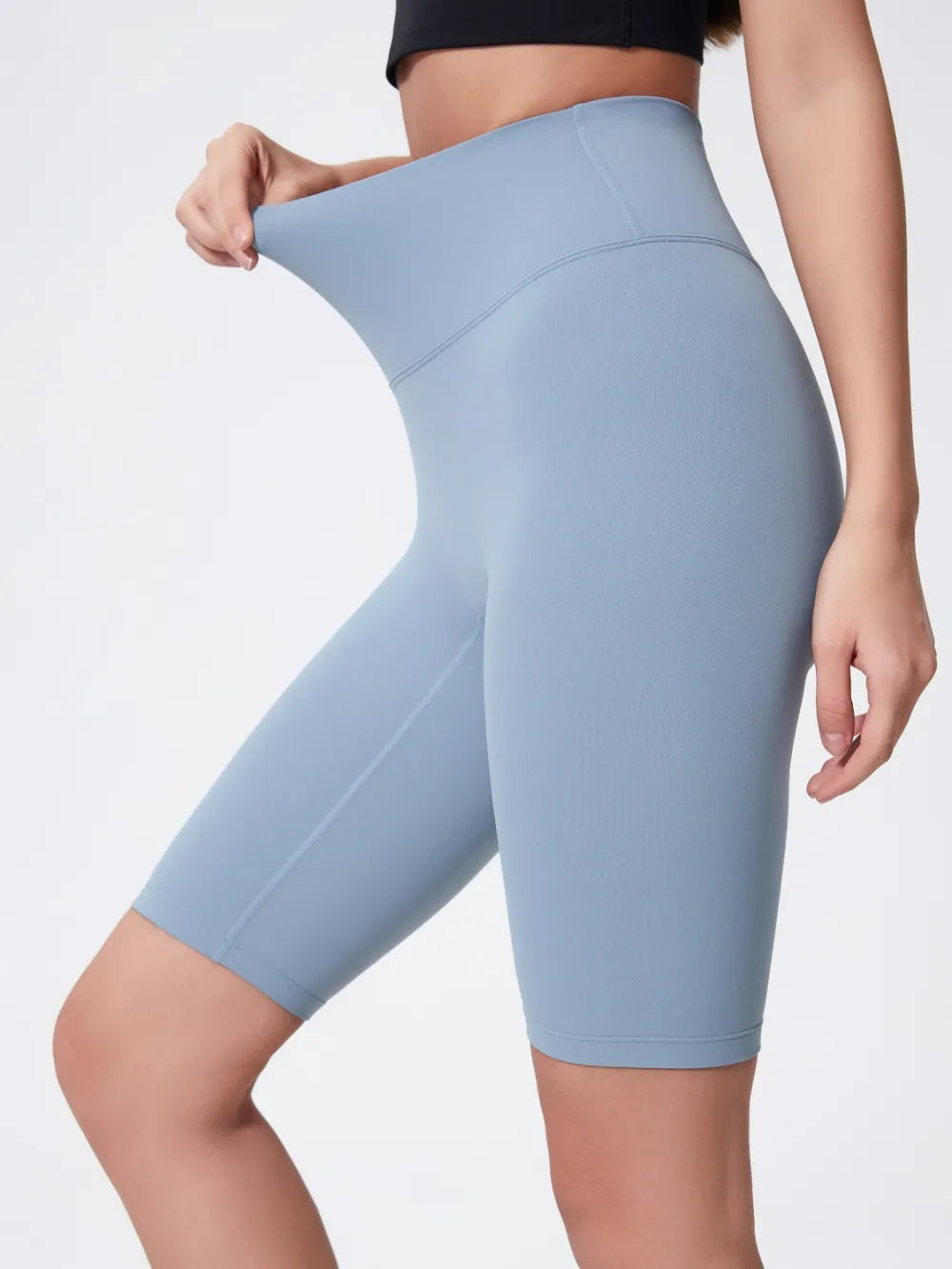 high rise wide waistband active shorts waistband and hem detail