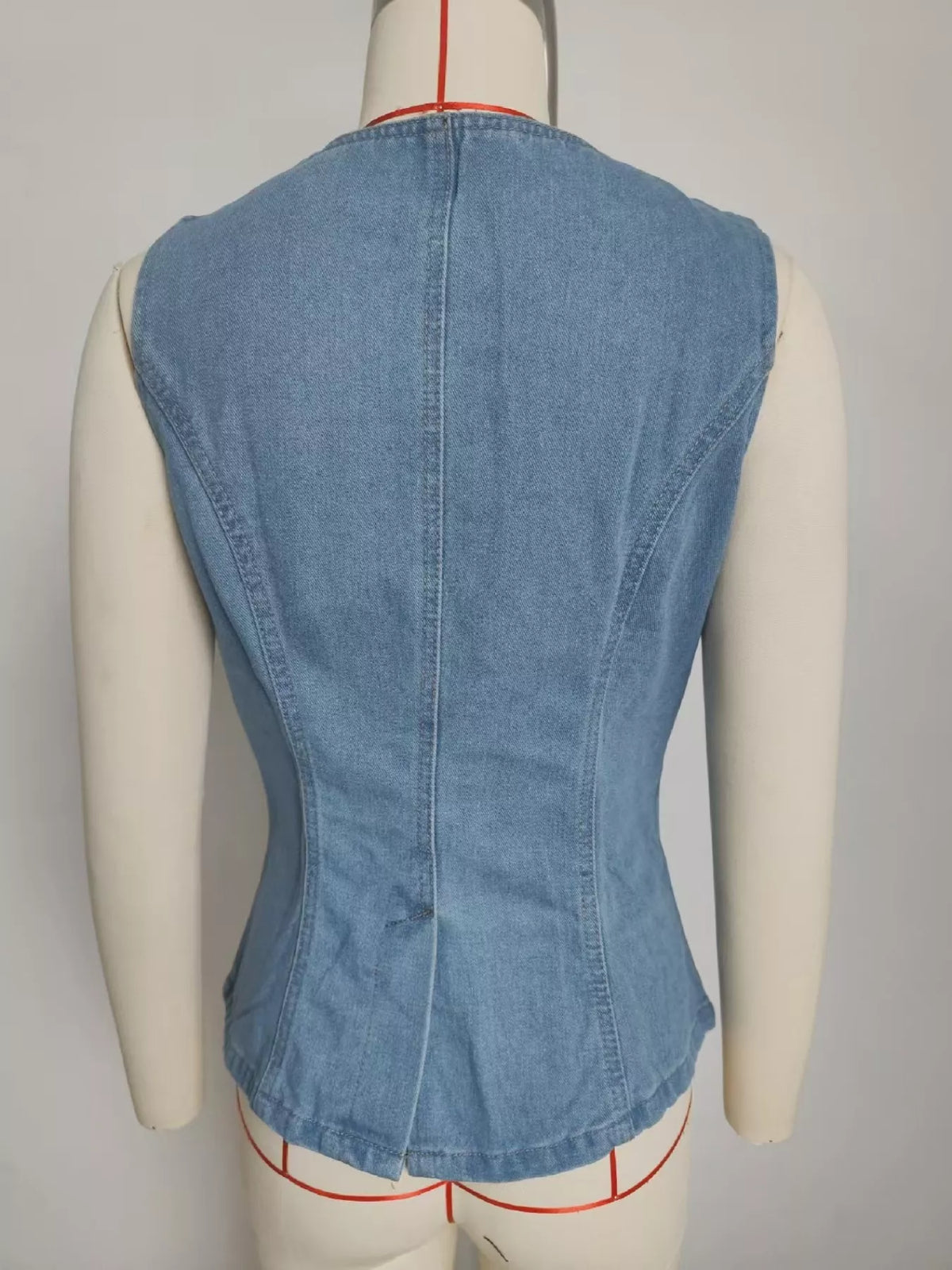 Button front vest and pants fabric texture