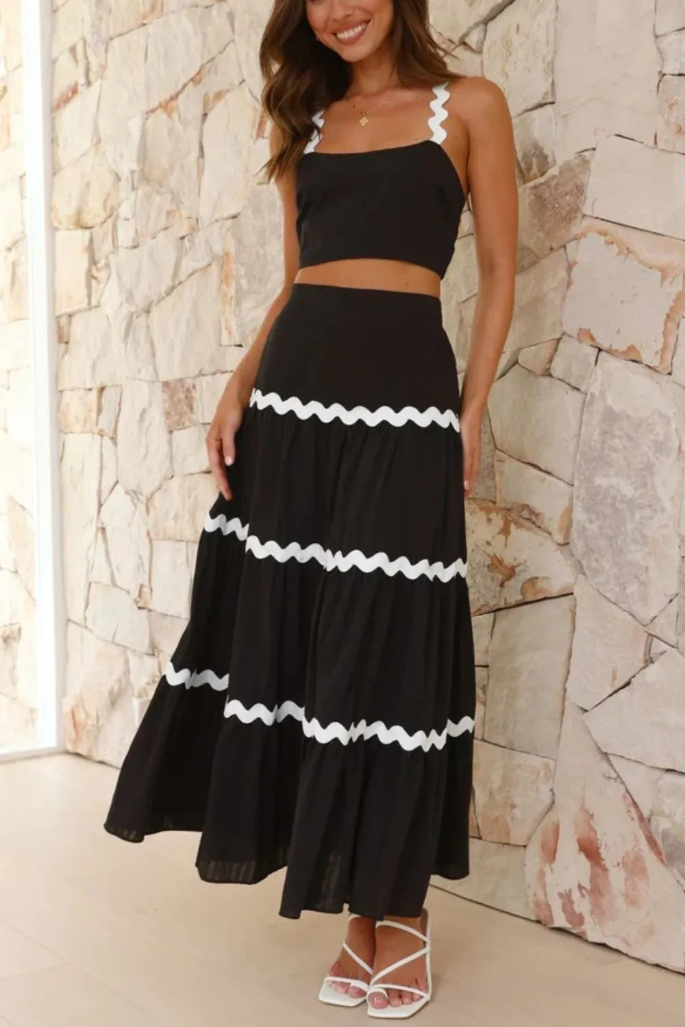 Flowing black maxi skirt of the set