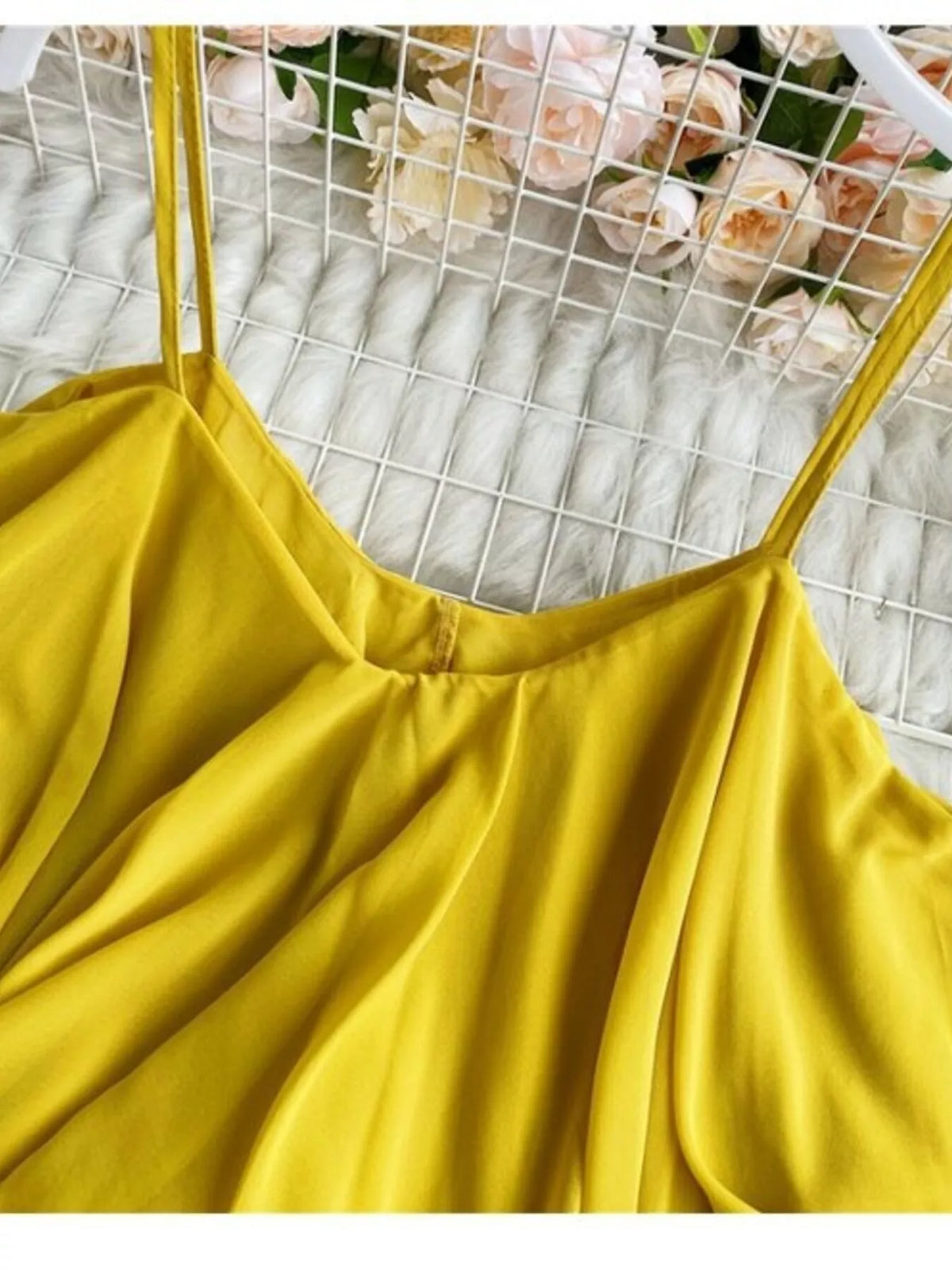 Ruffled flowy cami top close up detail