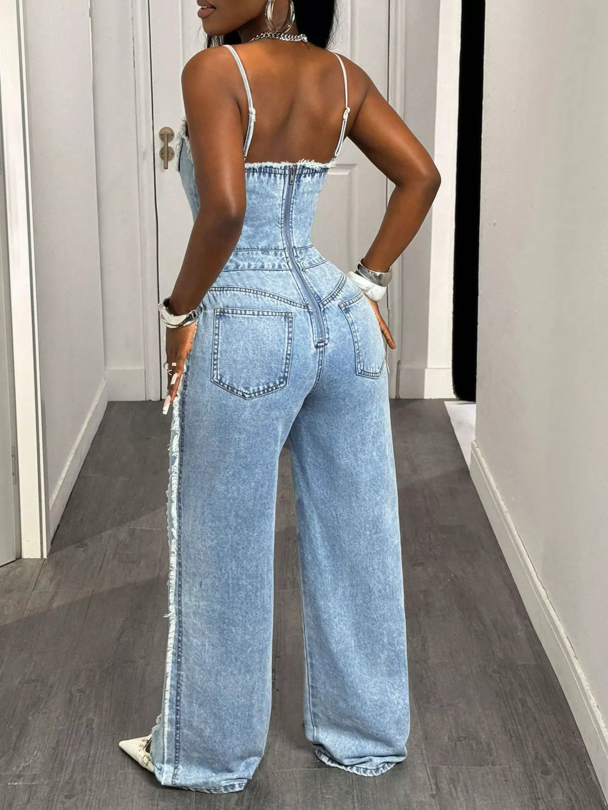 Full length view of the wide leg denim jumpsuit