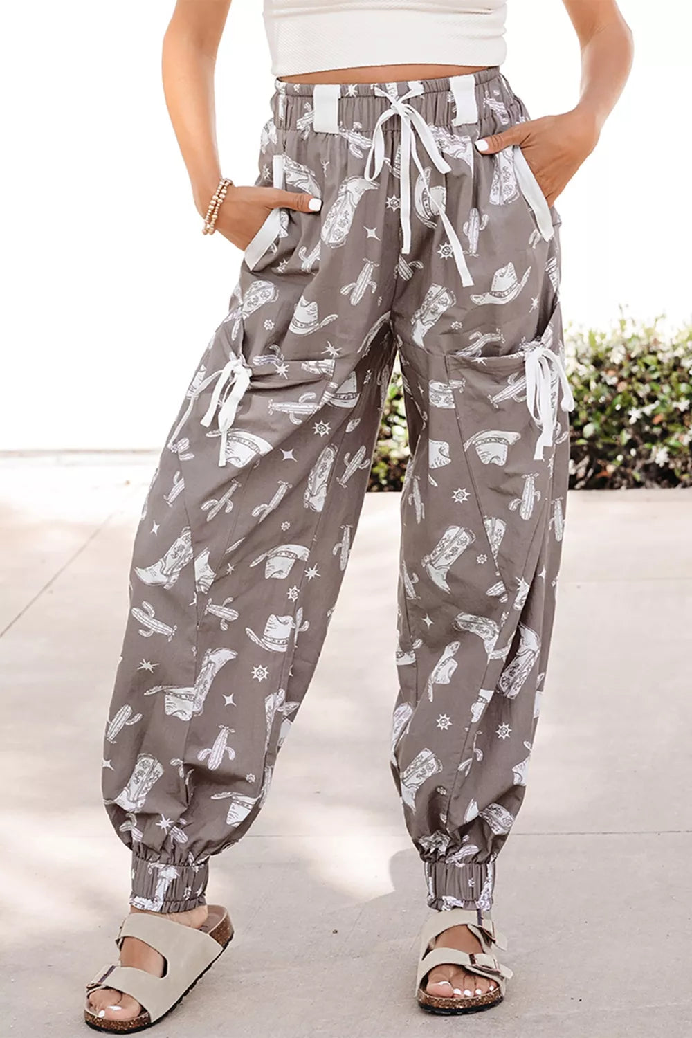 Mocha western cactus print drawstring jogger pants, front view