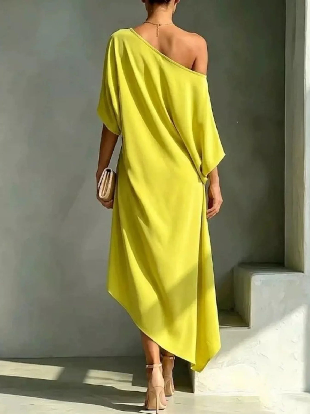 Asymmetrical one shoulder dress side view