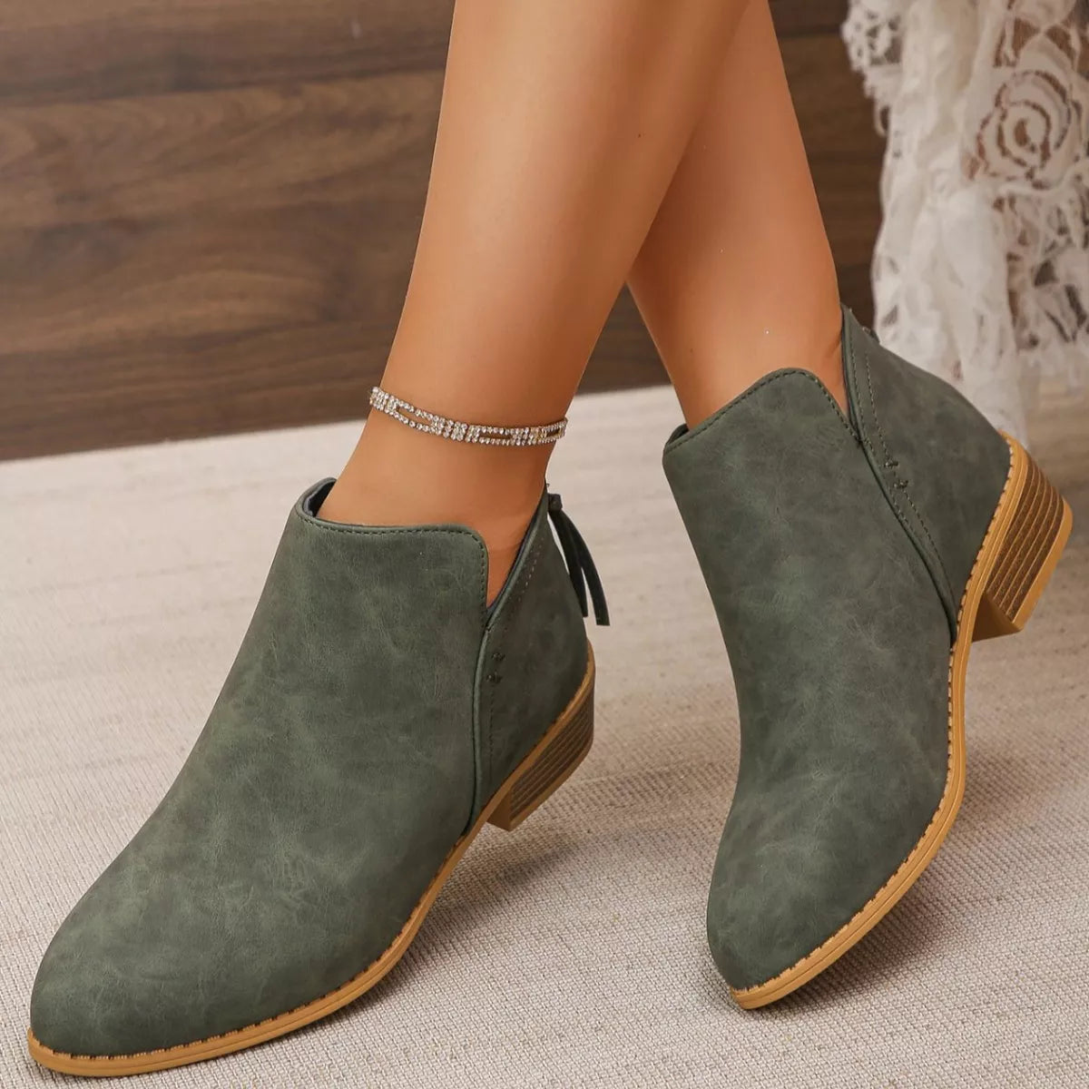 Point toe block heel ankle boots heel detail