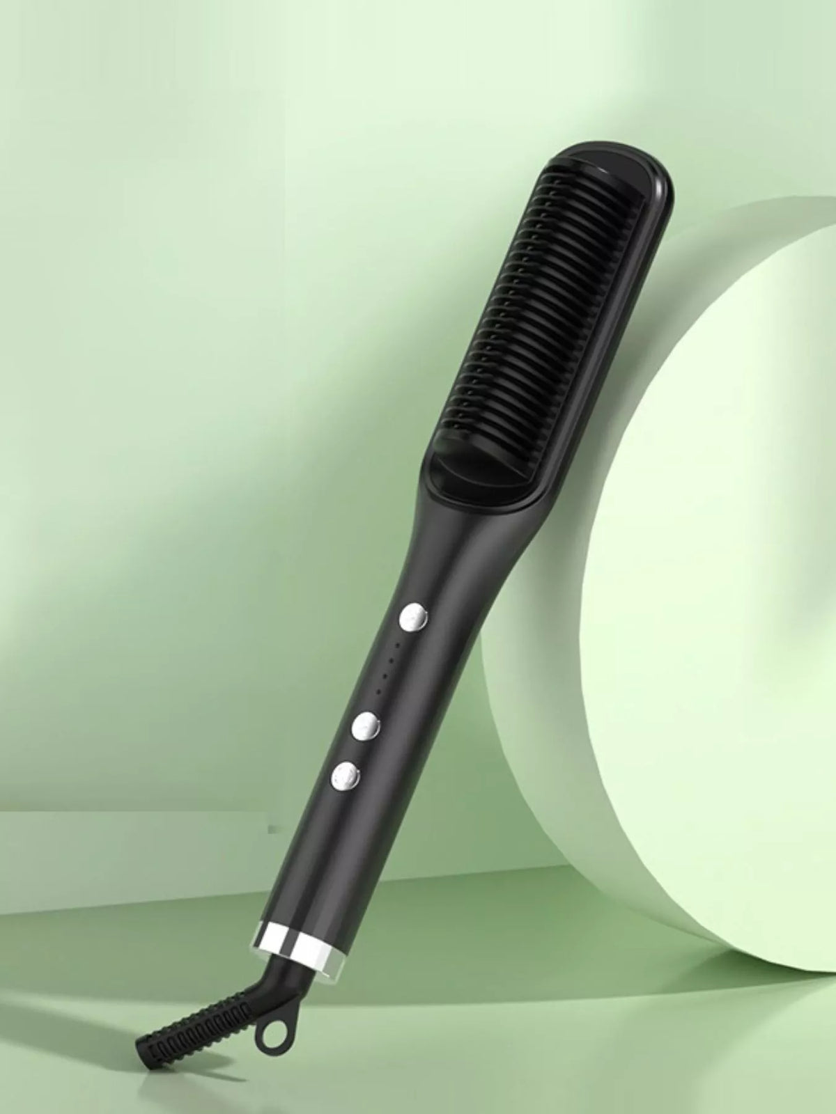 Straightening comb gliding through hair