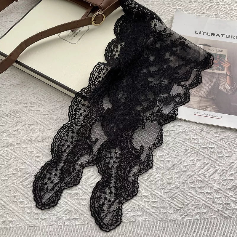 Elegant sheer scarf with intricate lace pattern