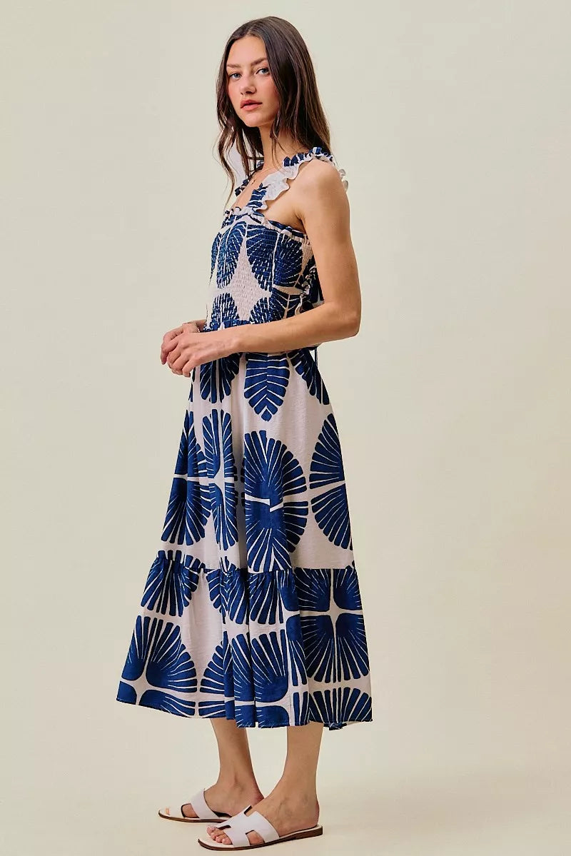 Navy abstract print smocked bodice tiered midi dress front view