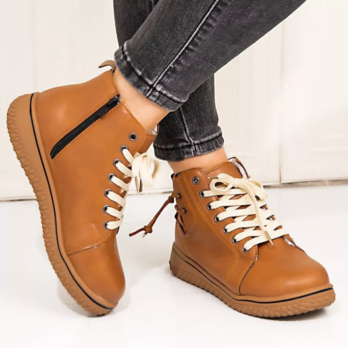 Round toe platform ankle boots heel and sole detail