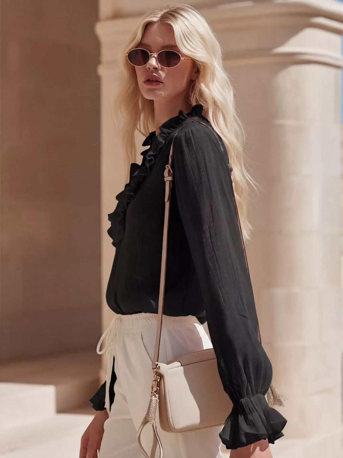 Ruffled V neck long sleeve blouse close up view