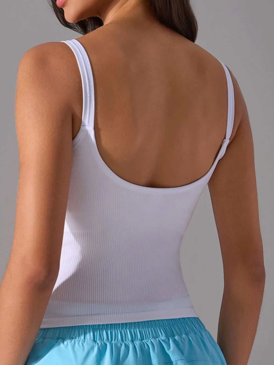 Scoop neck active tank with chest pads side view