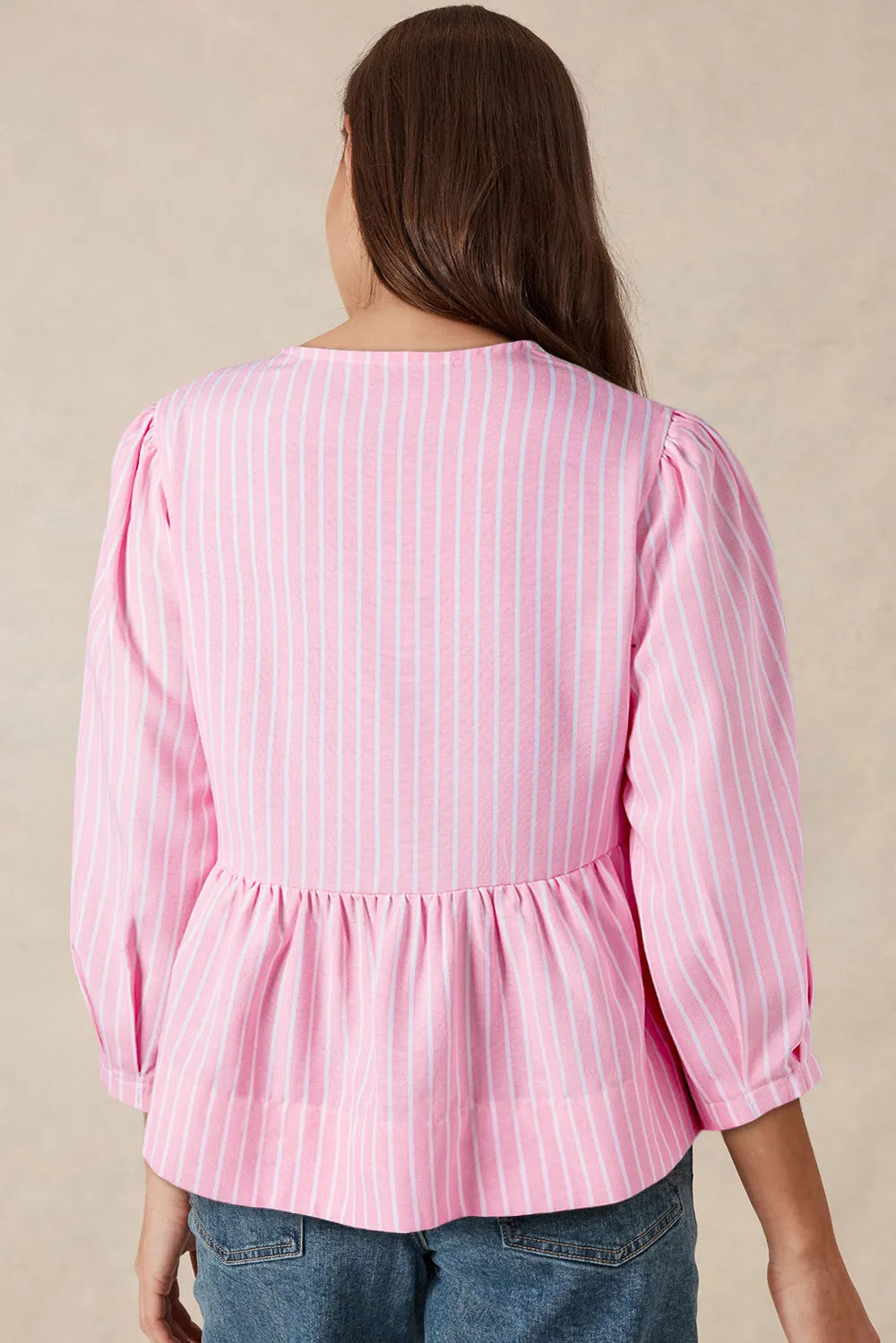 Striped round neck blouse side view